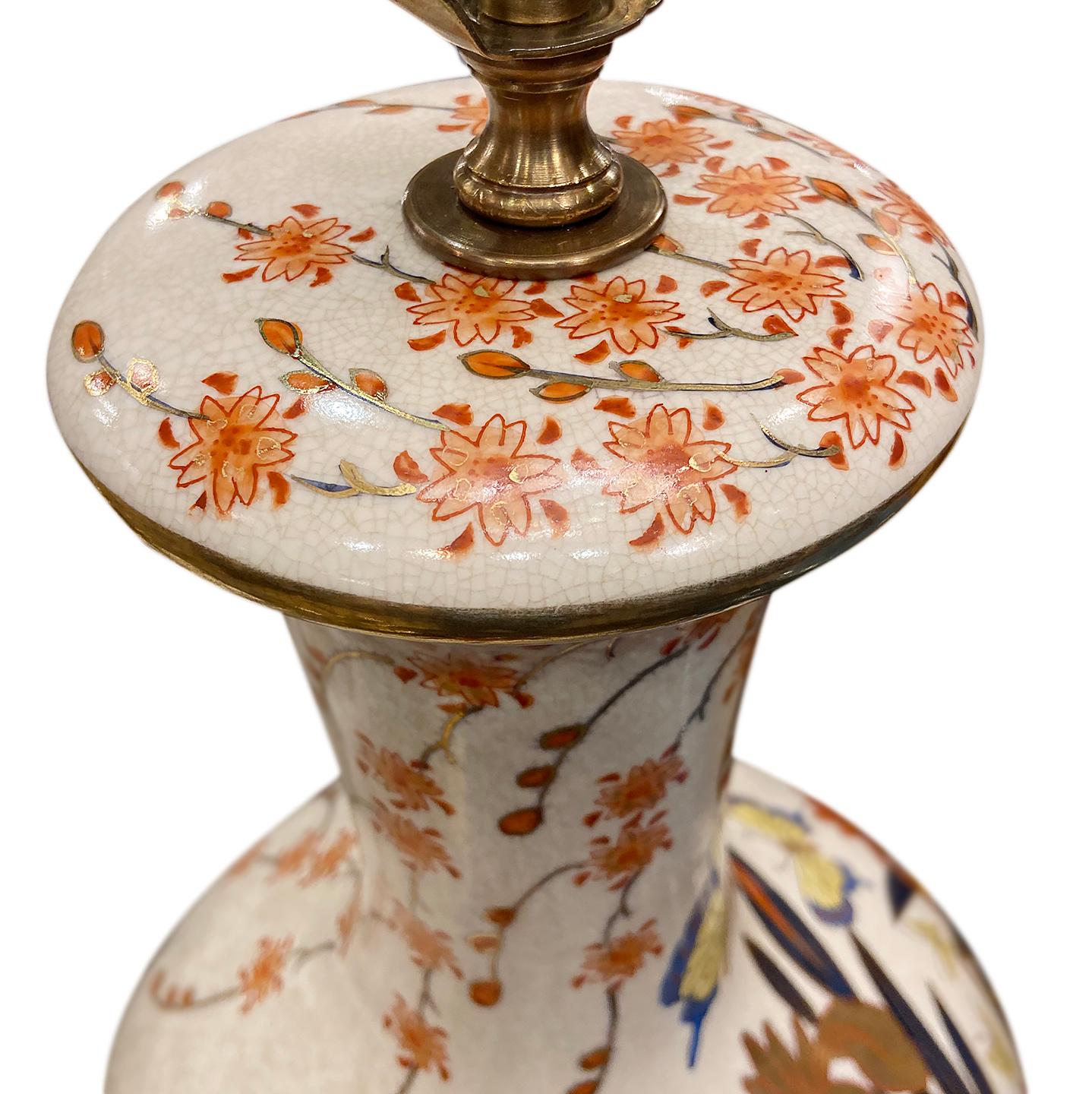 Pair of circa 1950's French porcelain table lamps with floral motif.

Measurements:
Height of body: 24