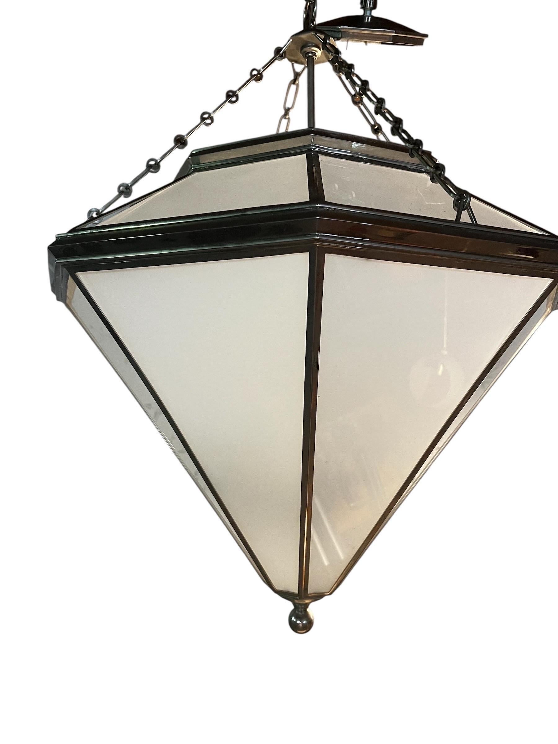 Listing for matching pair but willing to sell individually for $2,500 each.  

Art Deco style Ralph Lauren Cannes Pendant Lights.   Refined focal point in any kitchen, living room, entrance, powder or mud room. 

Polished Nickel finish.  Suspended