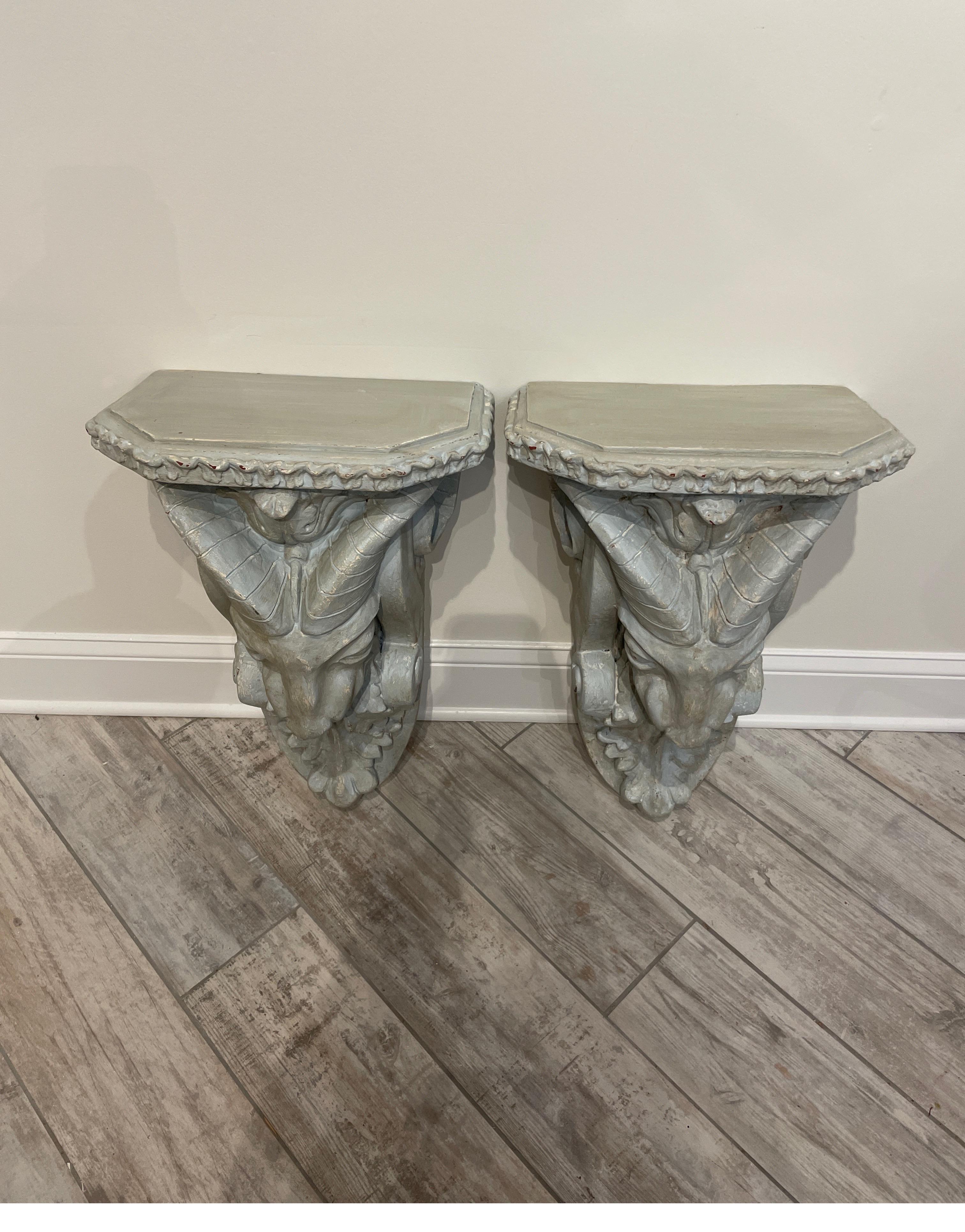 Vintage pair of large molded rams head wall brackets finished in a beautiful pale blue / grey hue. Very nice detail.