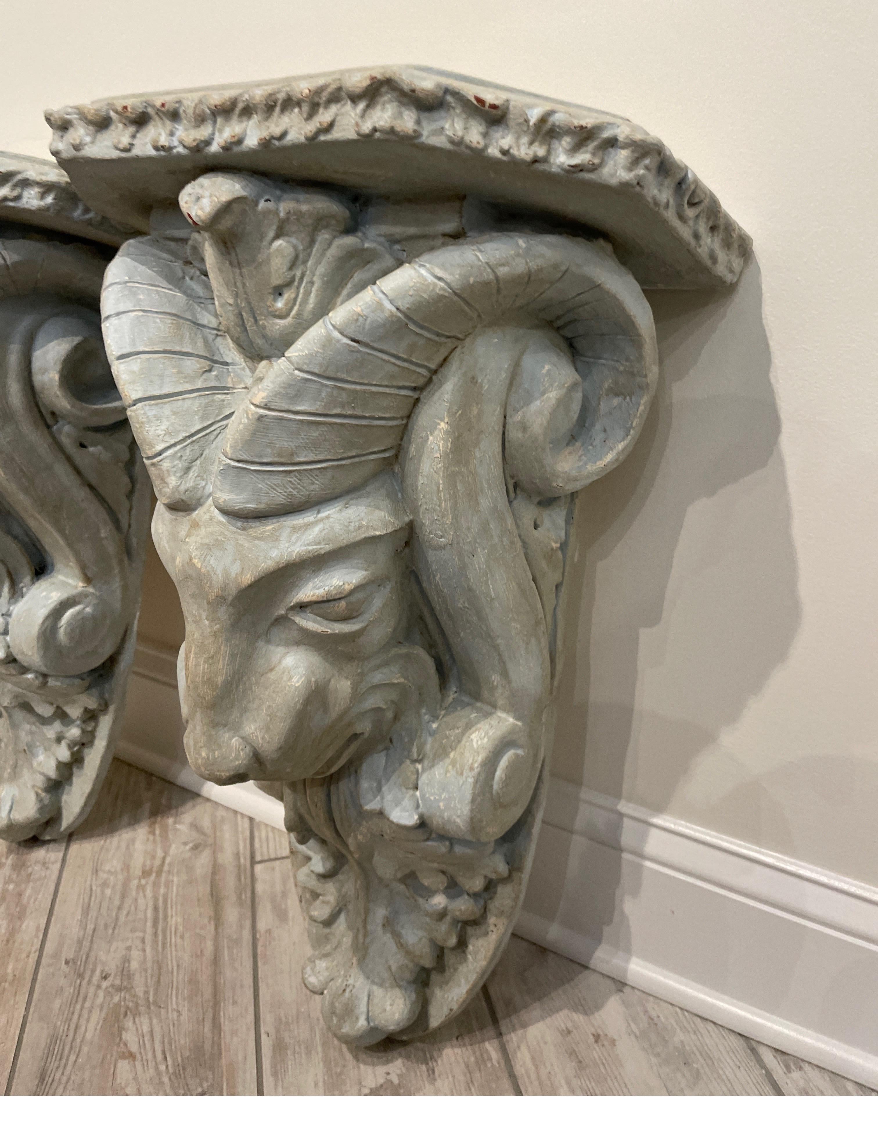 Composition Pair of Large Rams Head Wall Brackets For Sale