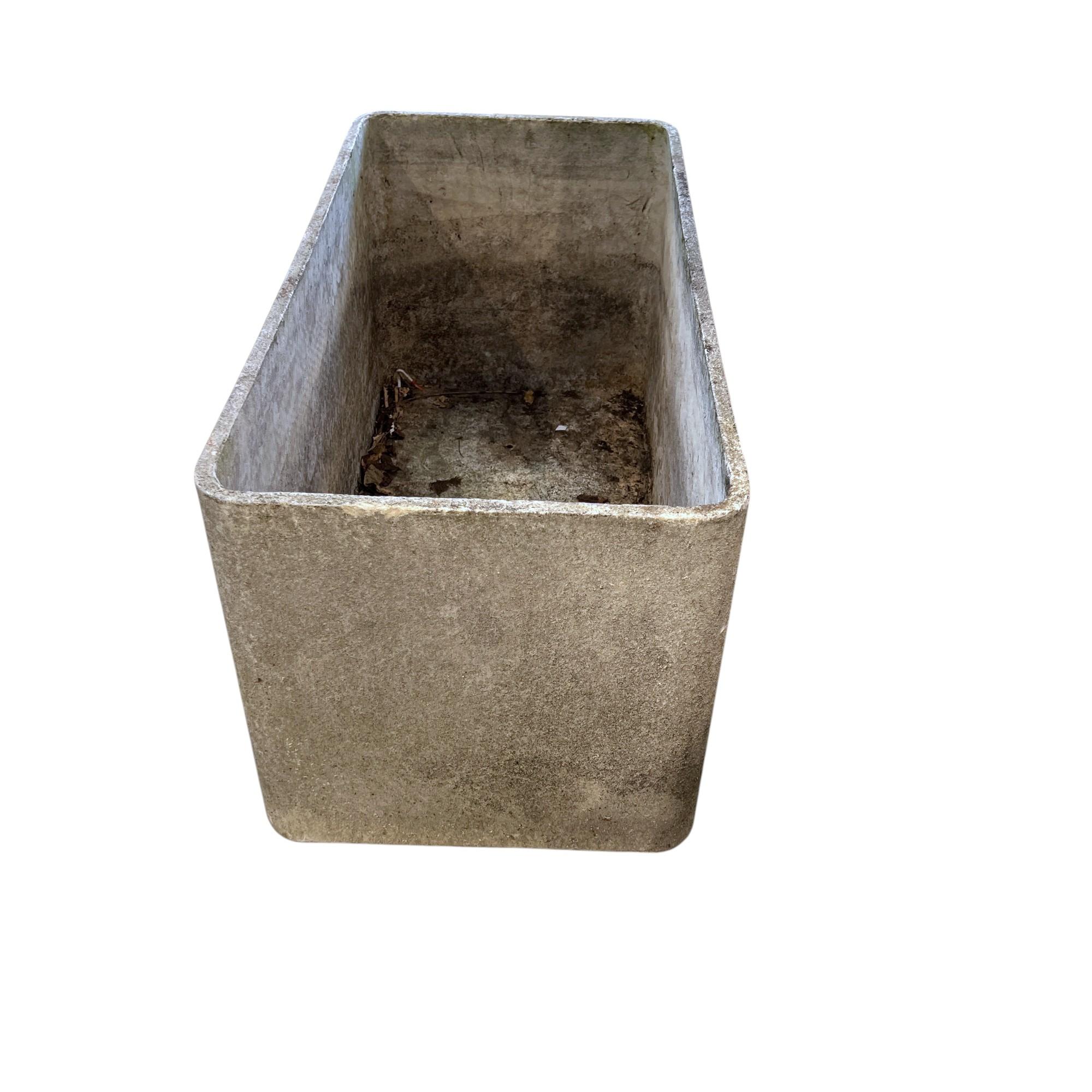 Willy Guhl was a prolific Mid-Century designer from Switzerland. He perfected a lightweight concrete product to create unique planters.