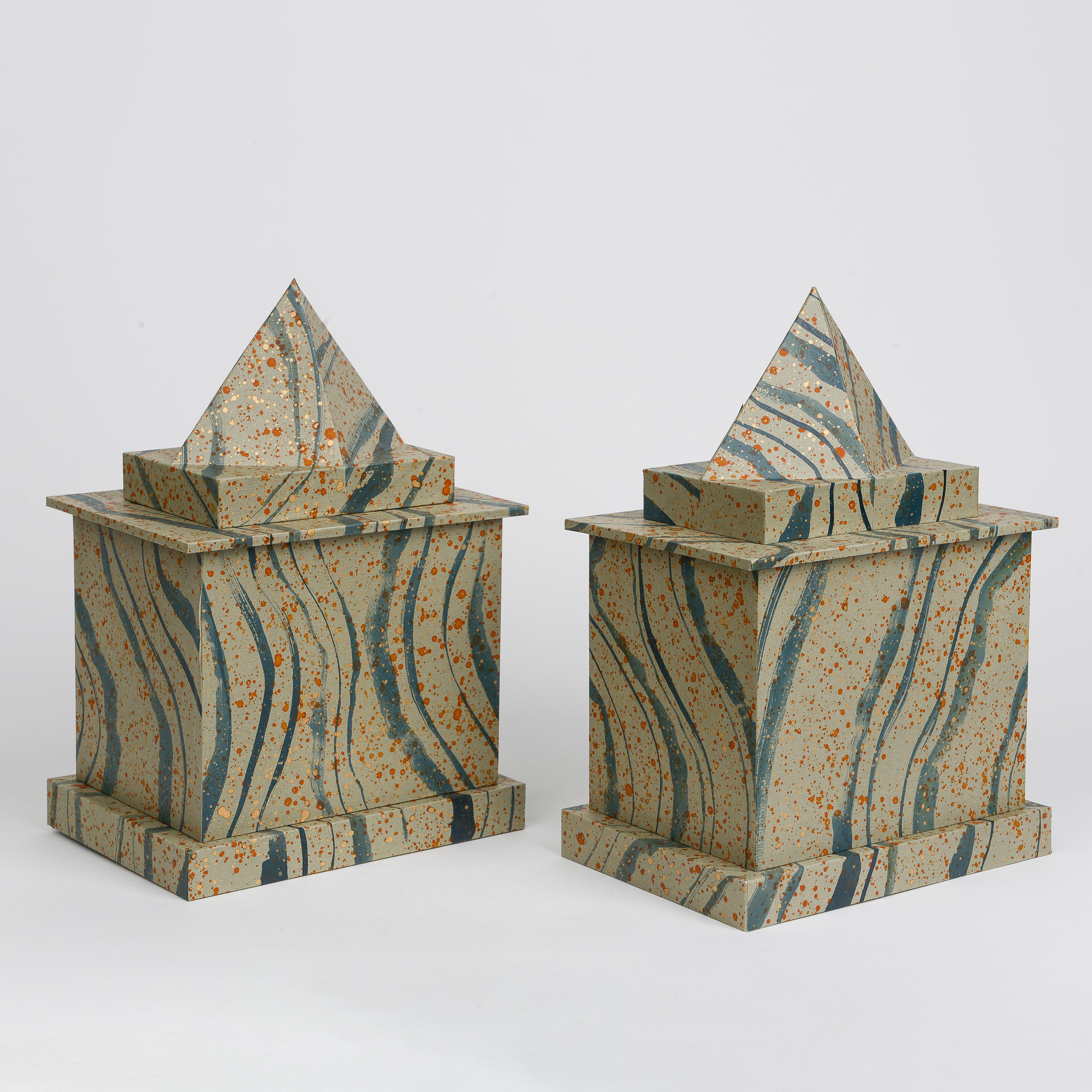 Each with removable pyramid lid; hand-painted with Prussian blue stripes and orange speckles on a taupe ground; hand-constructed.

From architectural follies of the eighteenth-century to crystalline rock formations, Thomas Engelhart translates the