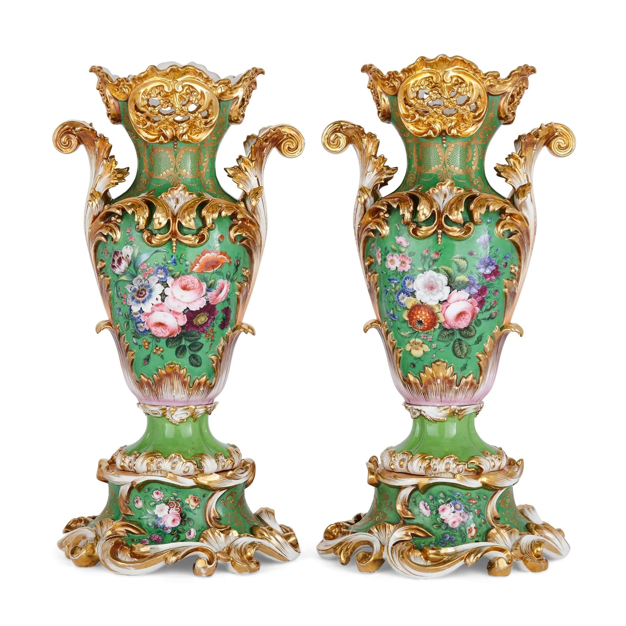 Pair of Large Rococo Porcelain vases with Painted Madonnas and Floral bouquets
English, 19th Century
Height 60cm, width 31cm, depth 26cm

Of flattened baluster form, with trellis-pierced necks and scrolling acanthus handles, these beautiful
