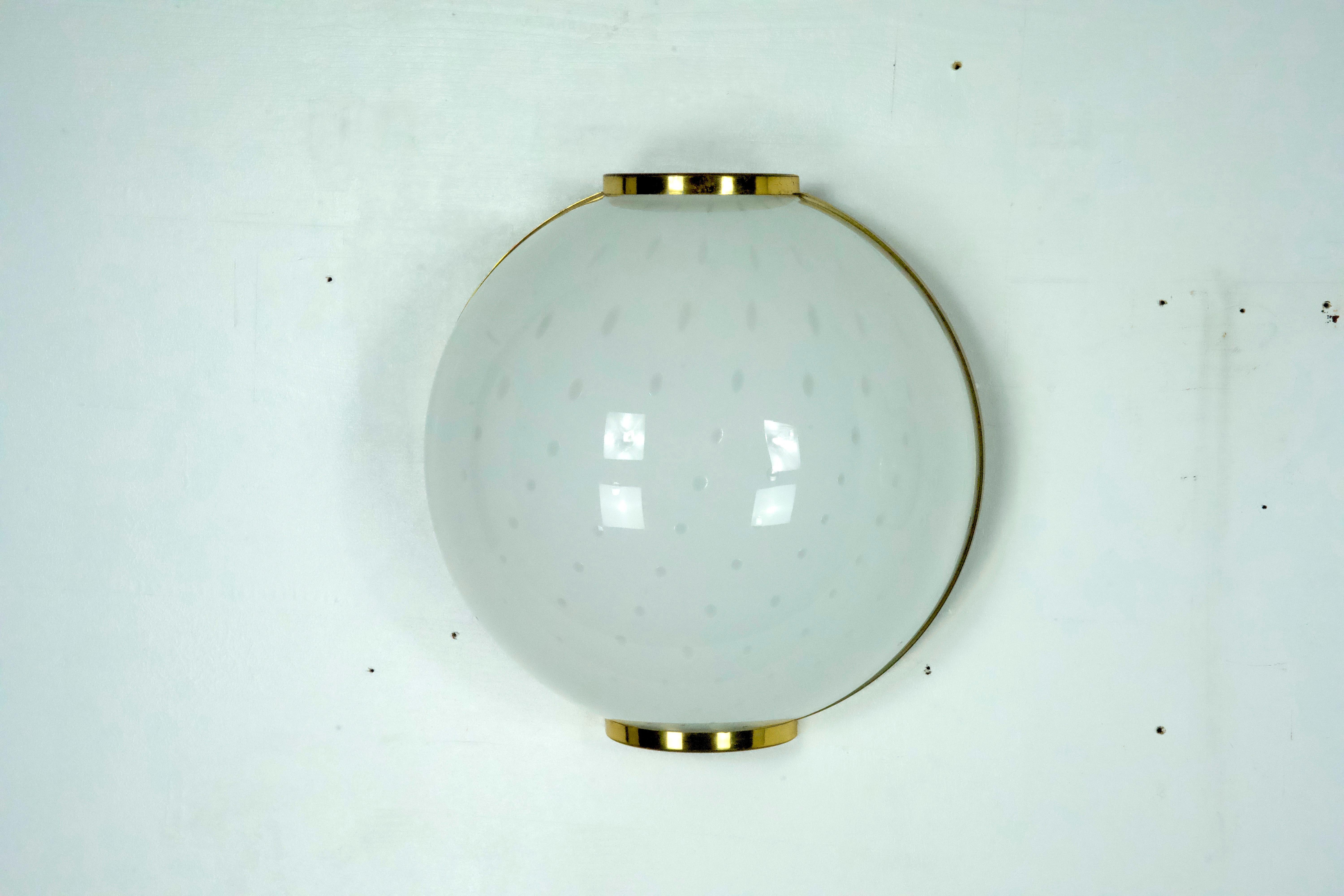 Mid-Century Modern Pair of large round murano bullicante glass sconces with brass. Italy 1970s For Sale