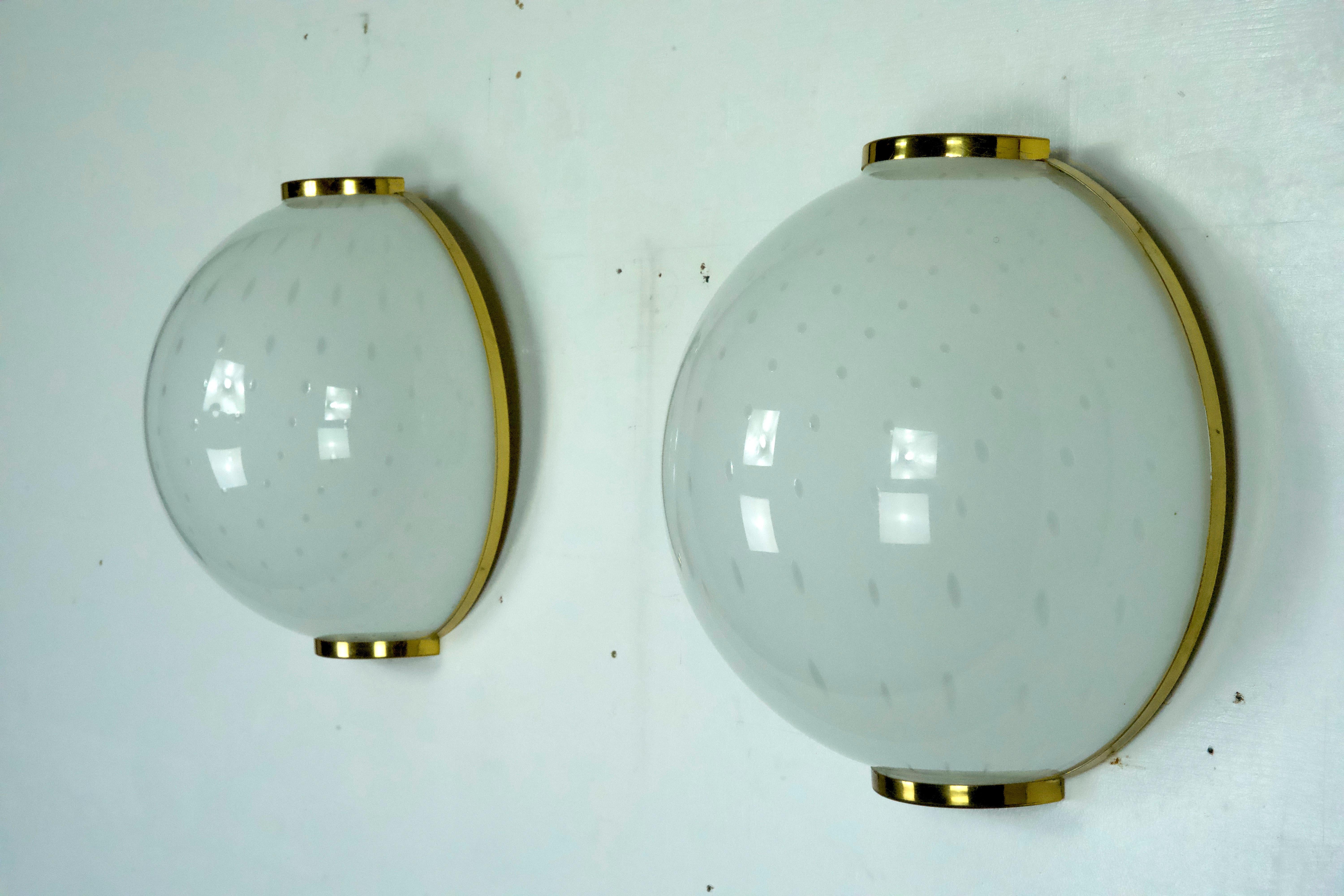 Italian Pair of large round murano bullicante glass sconces with brass. Italy 1970s For Sale