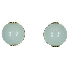 Pair of large round murano bullicante glass sconces with brass. Italy 1970s