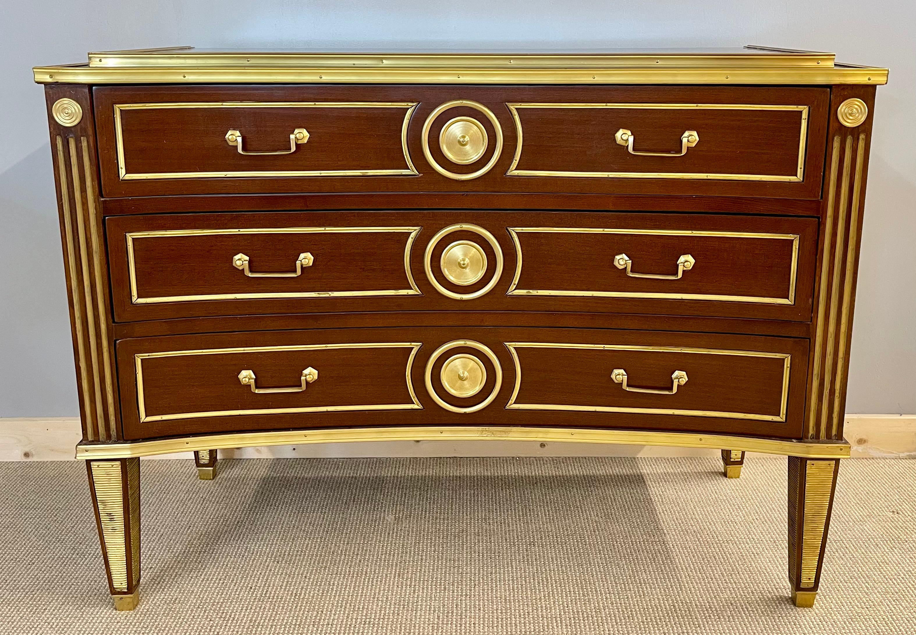 Pair of Russian neoclassical style inverted front commodes or chests. These have to be seen to be believed. One of a kind pair of deep inverted curved front commodes in the Russian neoclassical style having the flair of Maison Jansen. The tapering
