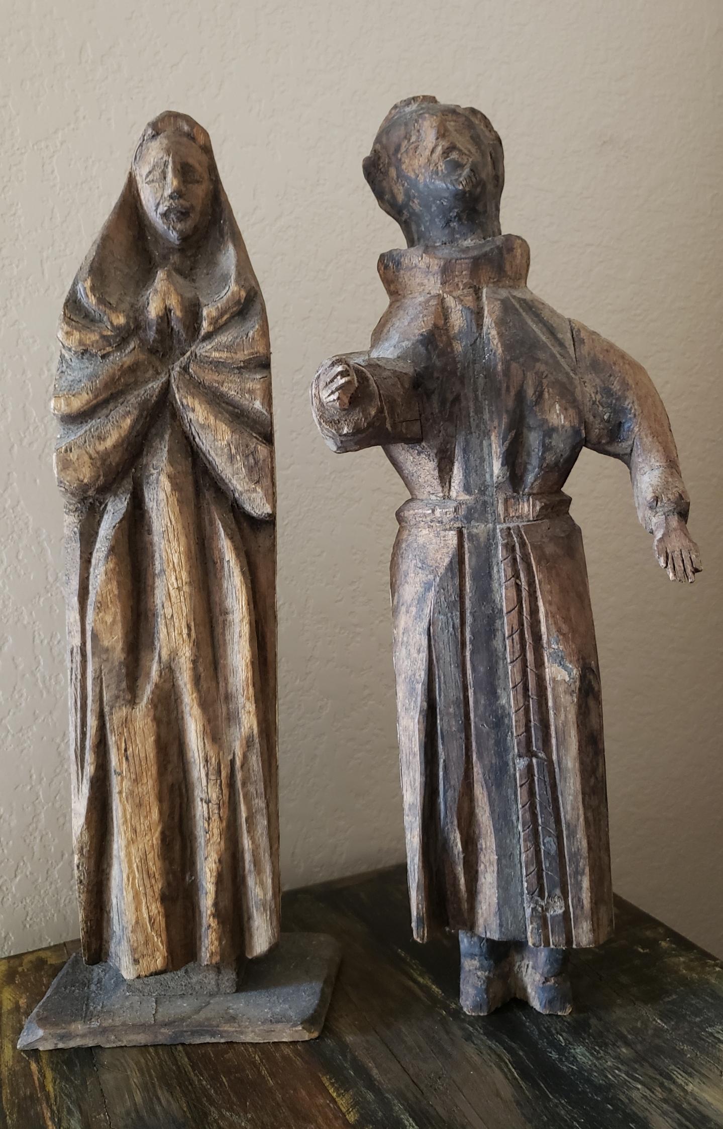 A rare one-of-a-kind pair of large rustic antique European hand carved stripped and scraped wood Santo church altar figures.

18th/early 19th century, primitive hand-crafted construction, finely detailed and sculpted, depicting Saint Francis of