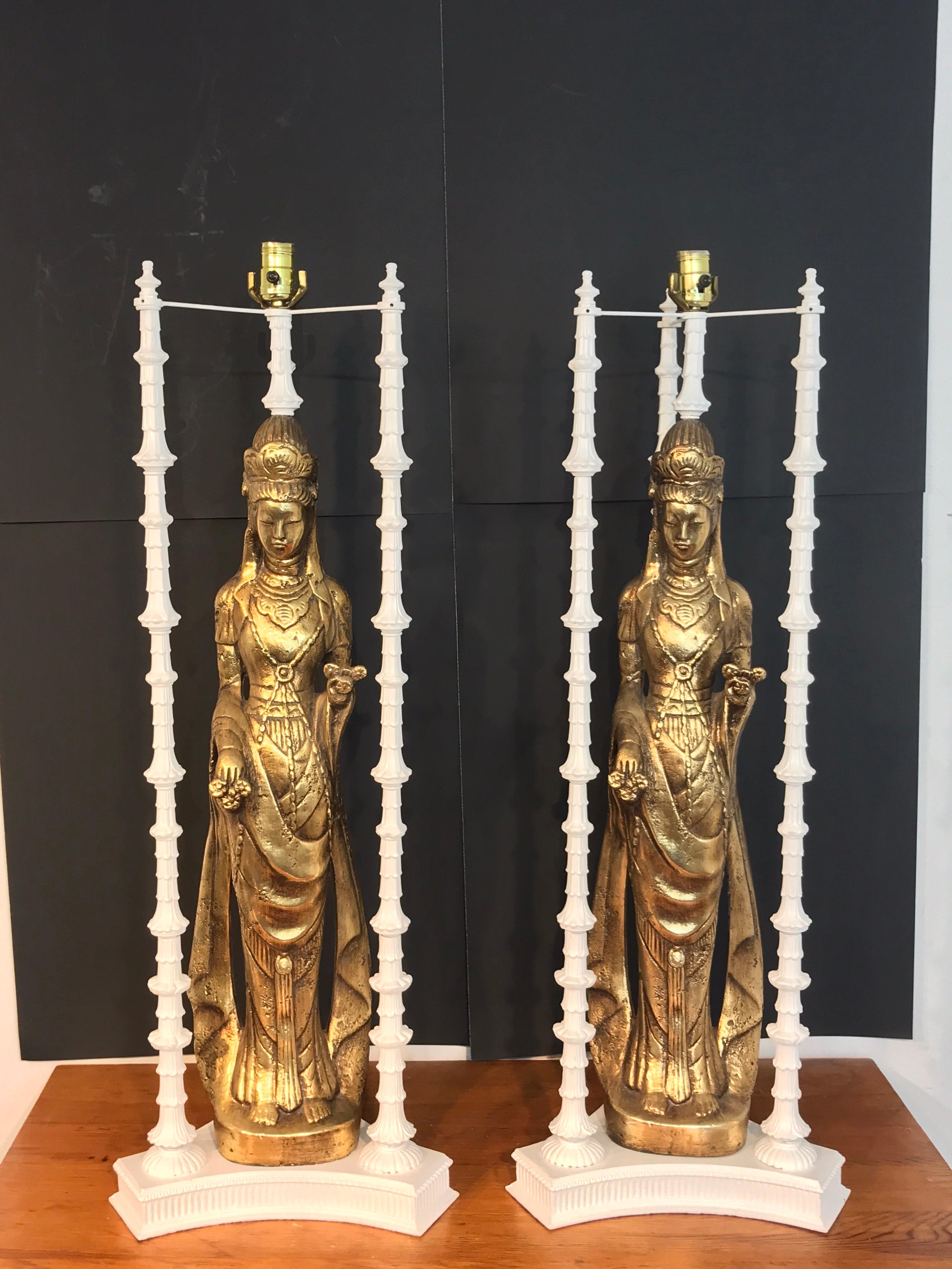 Pair of large scale gilt Quan Yin lamps, in the style of James Mont, each with a 30