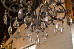 Pair of Large Scale Iron and Crystal Chandeliers