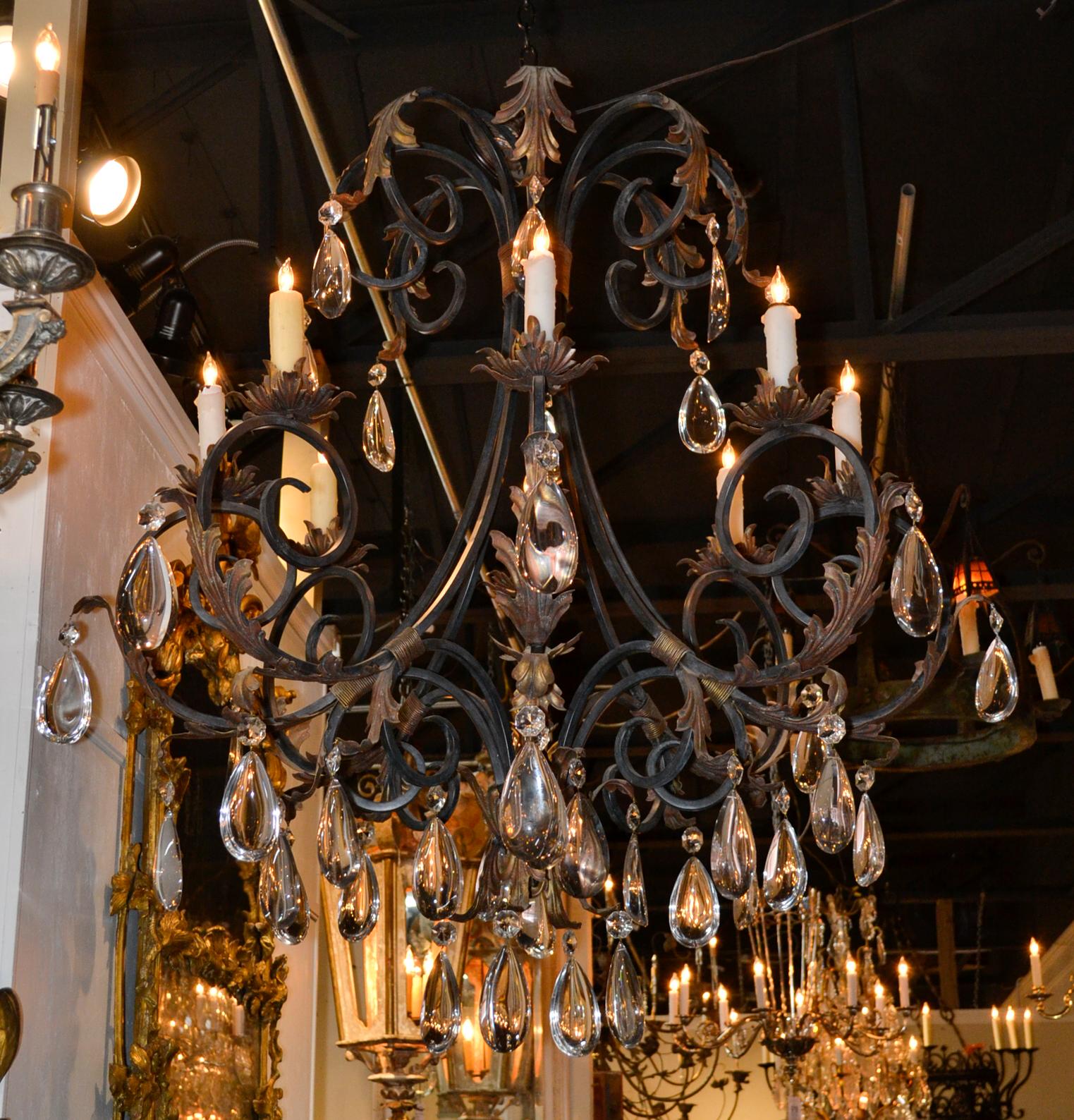 Contemporary Pair of Large Scale Iron and Crystal Chandeliers