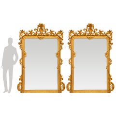 Paire de grands miroirs italiens de style Louis XV du 19ème siècle en bois doré