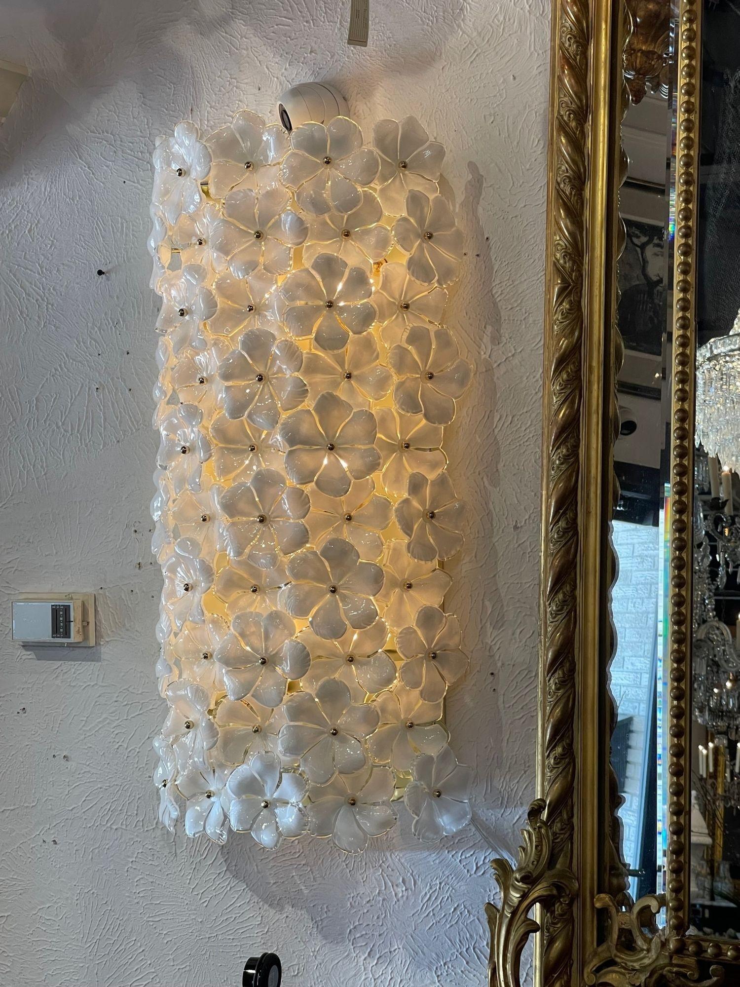 Decorative pair of large scale modern Murano flower sconces. Creates a gorgeous sculptural look and very fine quality as well. These are exquisite!!