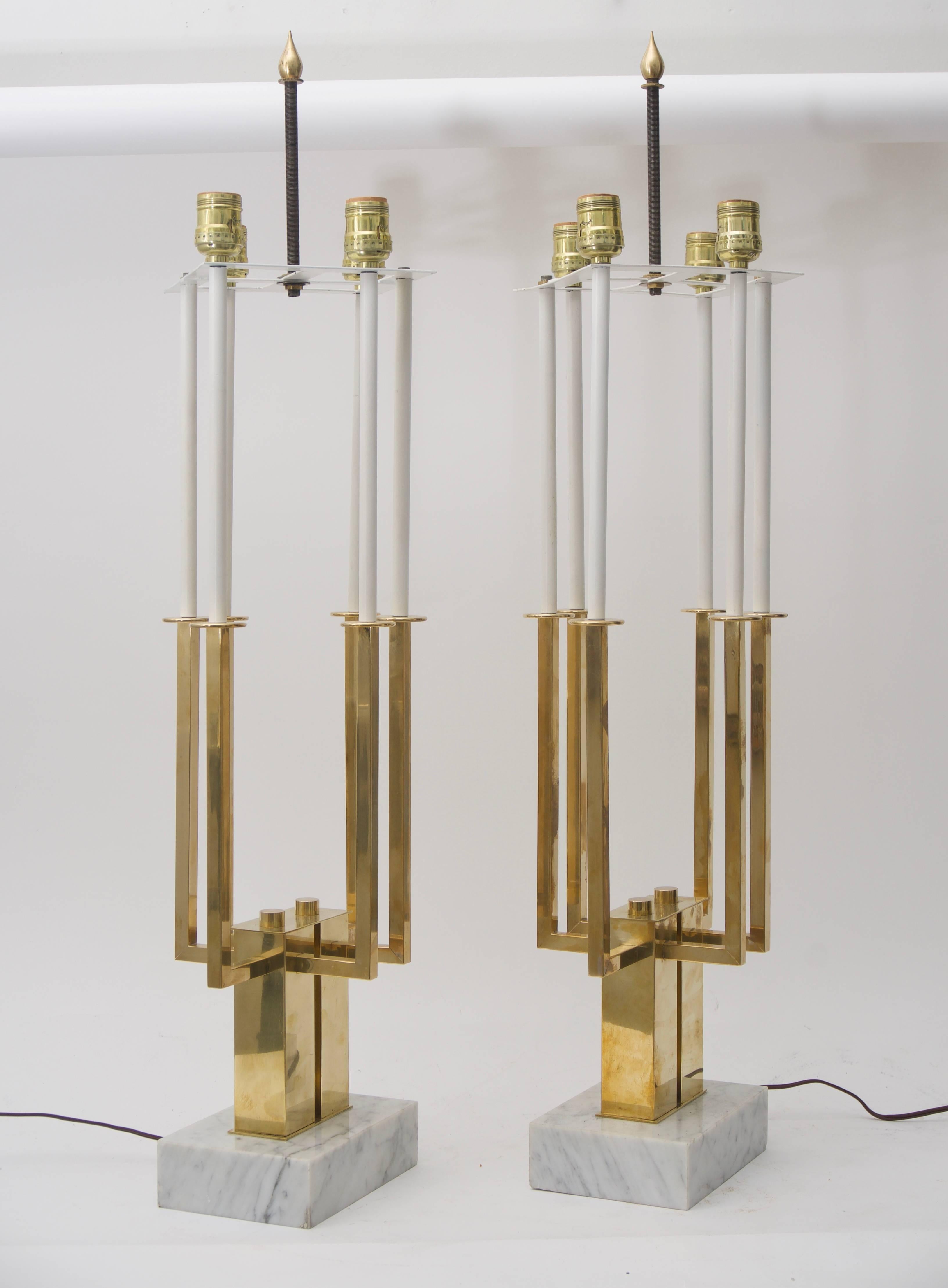 This stylish pair of Stiffel tables lamps are very much in the style of pieces designed by Tommi Parzinger in the late 1940s. The form is very much 