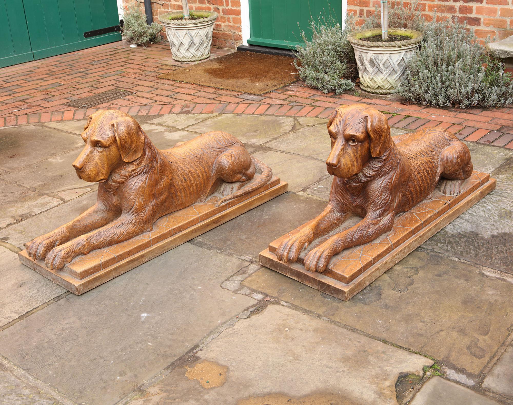 Pair of Large Scale Swiss Black Forest Carved Couchant Hunting Dogs For Sale 2
