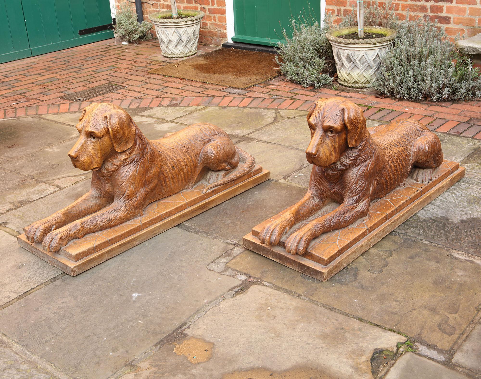 Pair of Large Scale Swiss Black Forest Carved Couchant Hunting Dogs 2