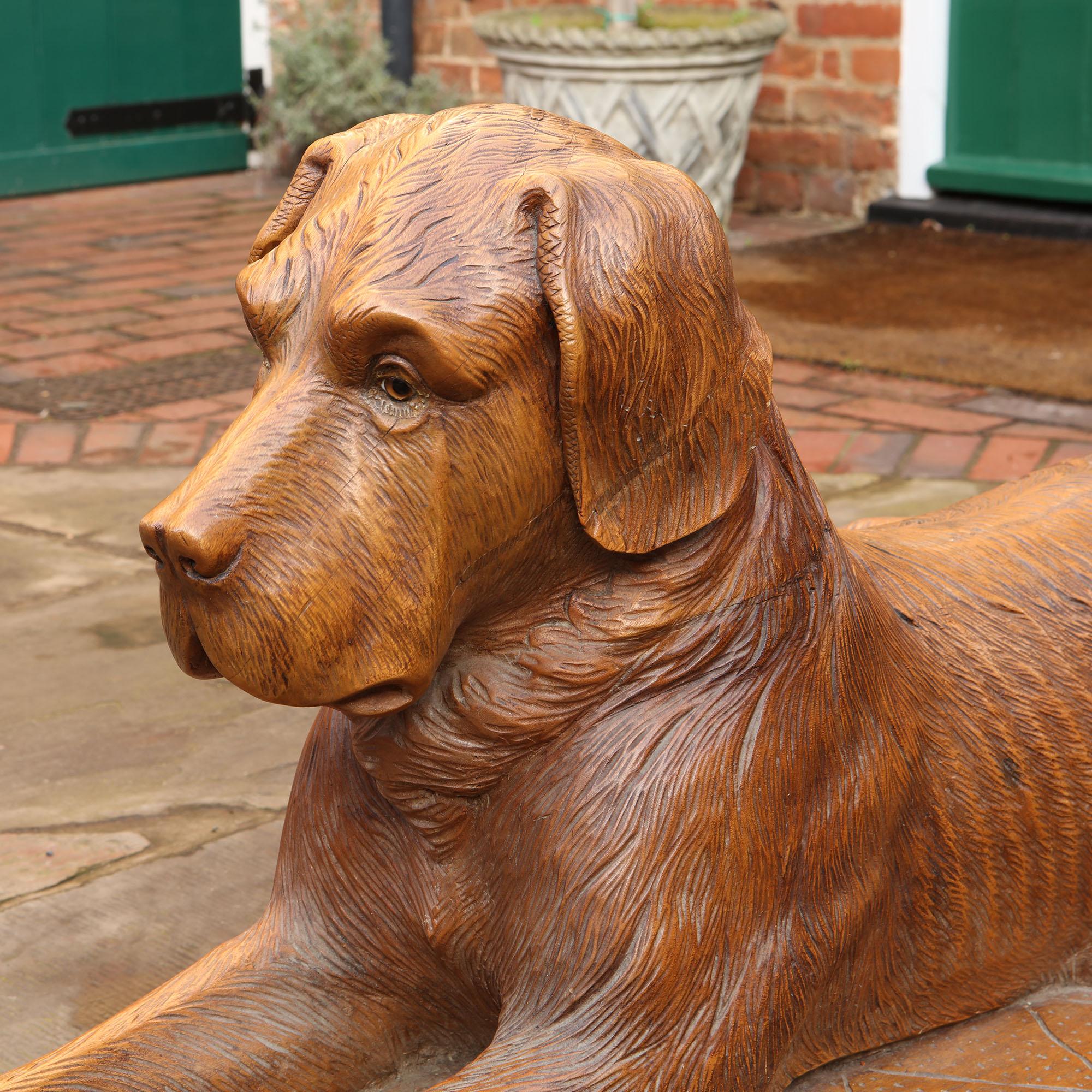 Loyal and watchful, this fabulous pair of Black Forest hounds, of excellent size and quality, are patiently waiting for their new home.

The Black Forest carvers used wood with a good density and little or no grain, a wood that could be carved