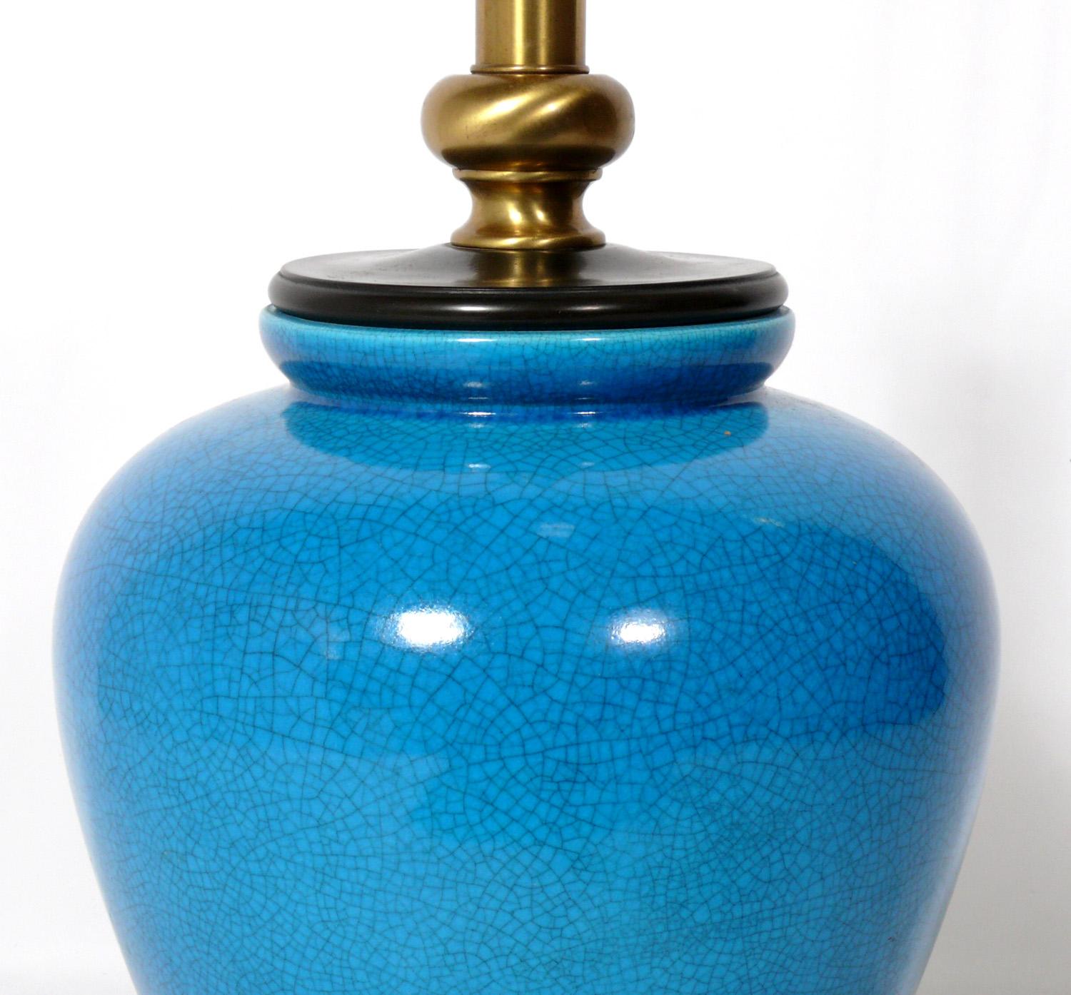 Pair of large scale turquoise blue ceramic lamps, American, circa 1960s. They have been rewired and are ready to use. The price noted includes the shades.