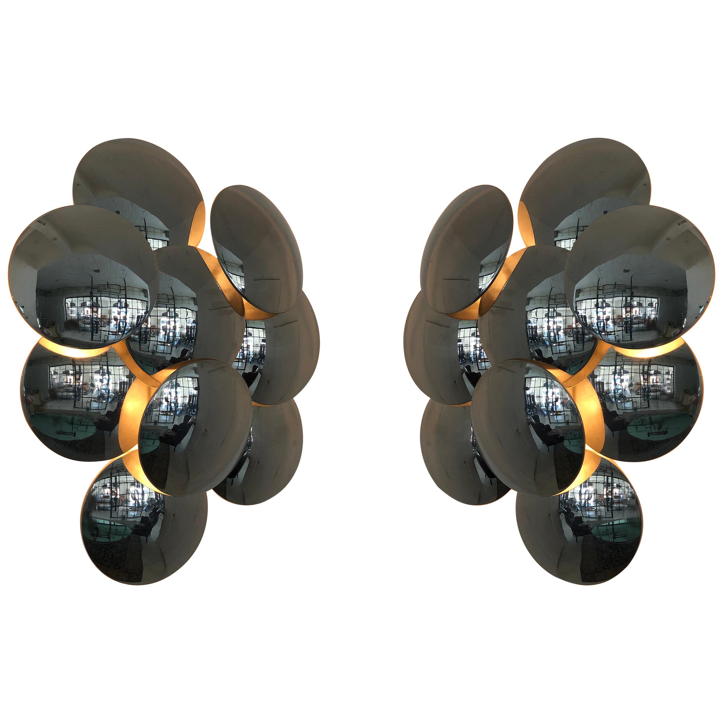 Pair of rare large sconces designed by Goffredo Reggiani. Manufactured in Italy, circa 1960s. Lacquered metal frame with nine chrome disks. Wired for US junction boxes. Retains original manufacturer's label. Each light takes one E27 100w maximum