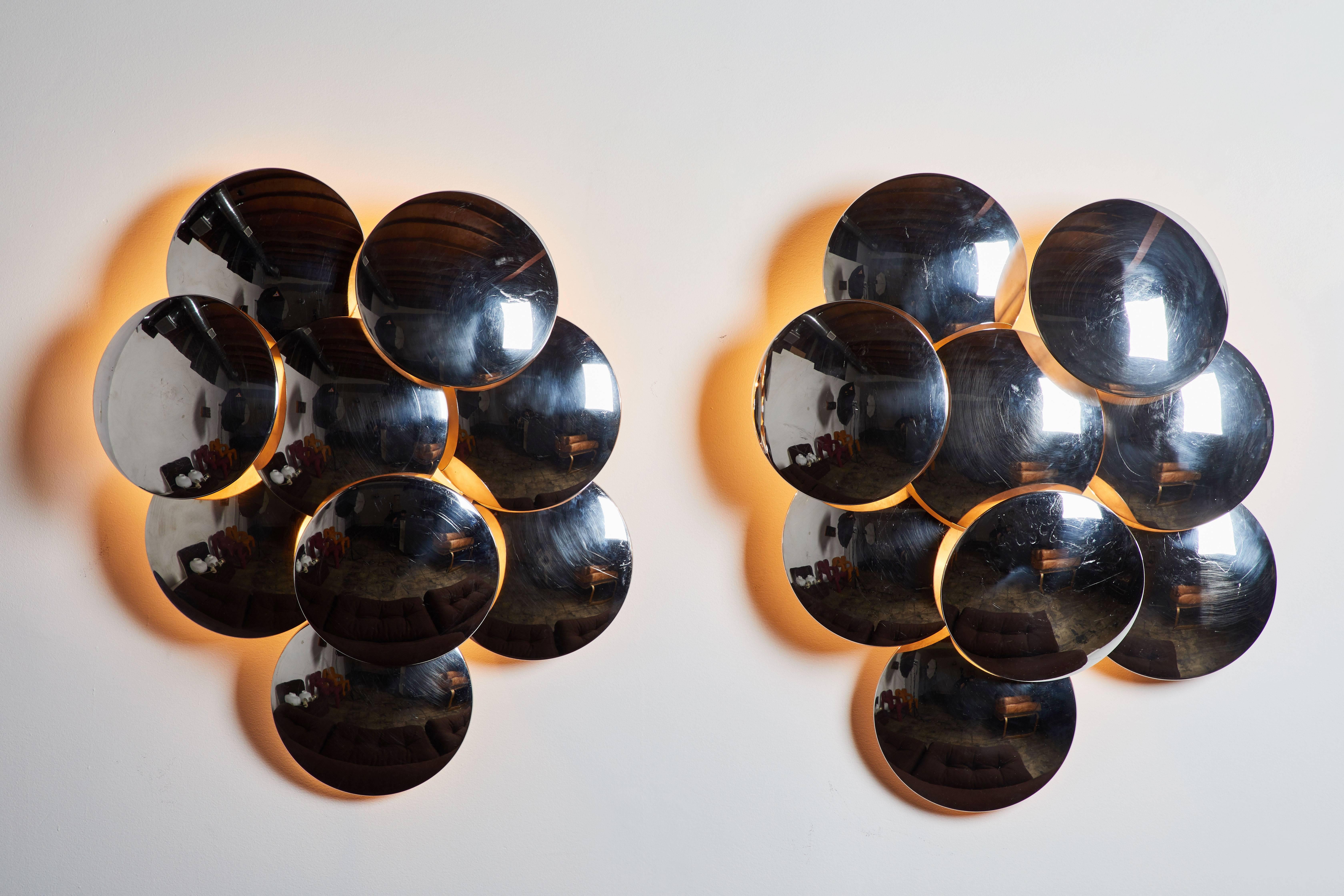 Pair of rare large sconces designed by Goffredo Reggiani. Manufactured in Italy, circa 1960s. Lacquered metal frame with nine chrome disks. Wired for US junction boxes. Retains original manufacturer's label. Each light takes one E27 100w maximum