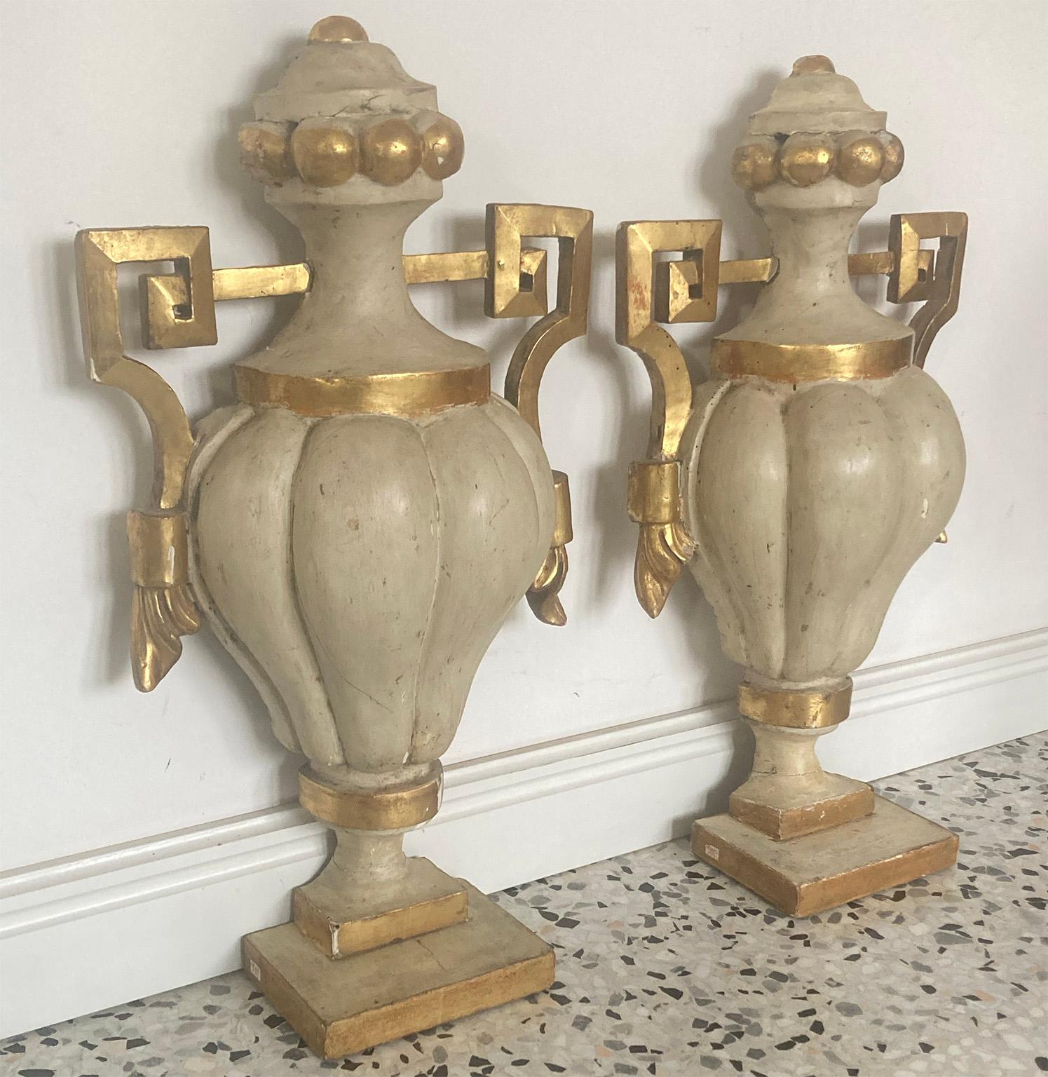 Couple of antique sculptural large elements with beautiful shape, in ivory and gold lacquered wood. 
Both used on table than wall.
 