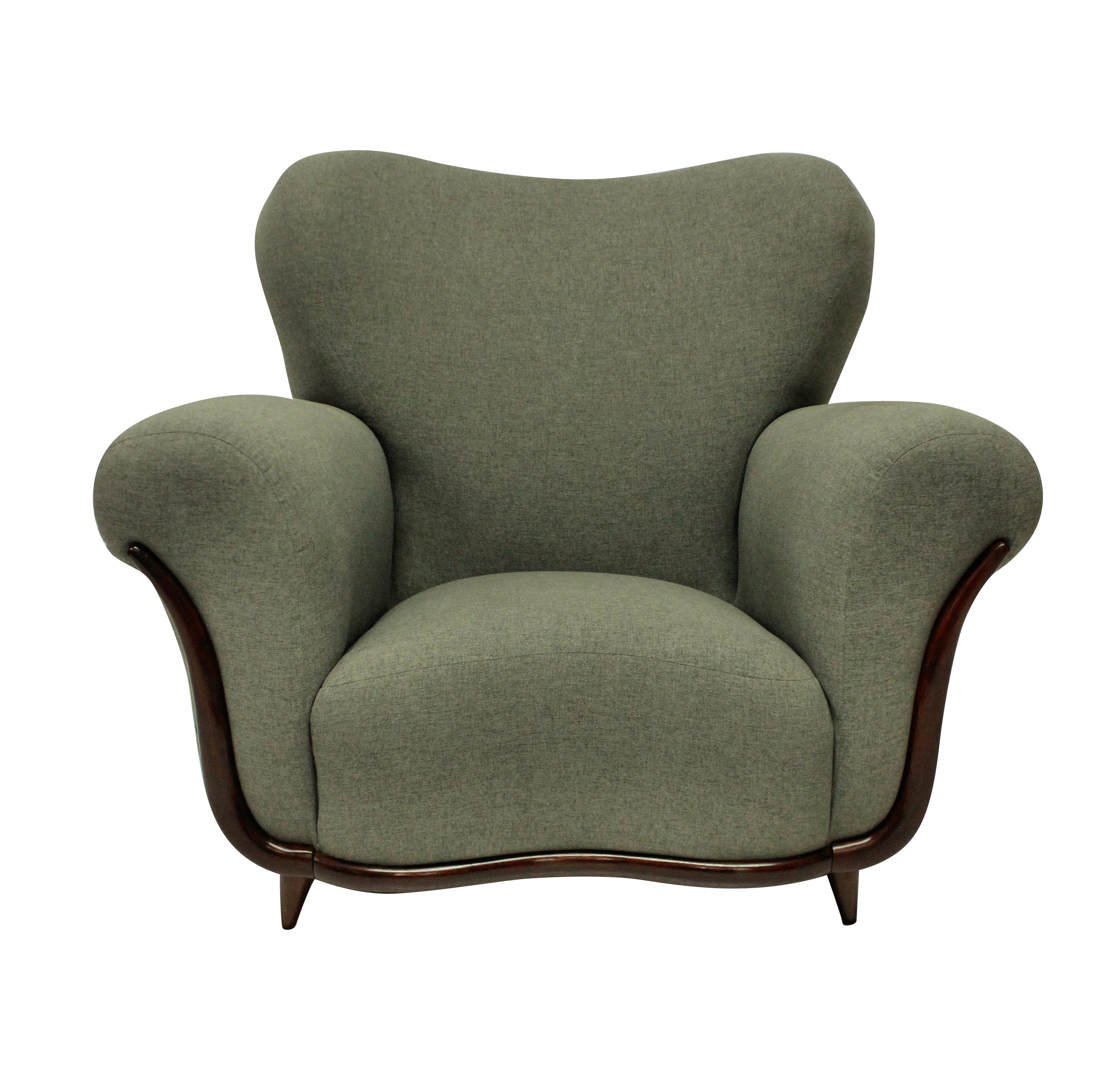 A pair of large Italian sculptural armchairs by Ulrich which is very comfortable. Newly upholstered in grey fabric and in a Minimalist fashion without piping or buttons, which accentuates the curved shapes. On tapering French polished feet and