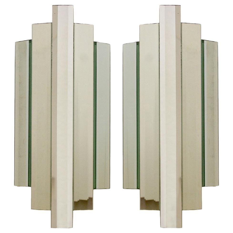 Paire de grandes appliques murales sculpturales en verre miroir encastrées, années 1960