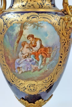 Pair of Large Sèvres Porcelain and Bronze Covered Vases