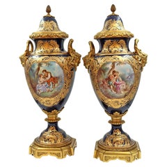 Pair of Large Sèvres Porcelain and Bronze Covered Vases