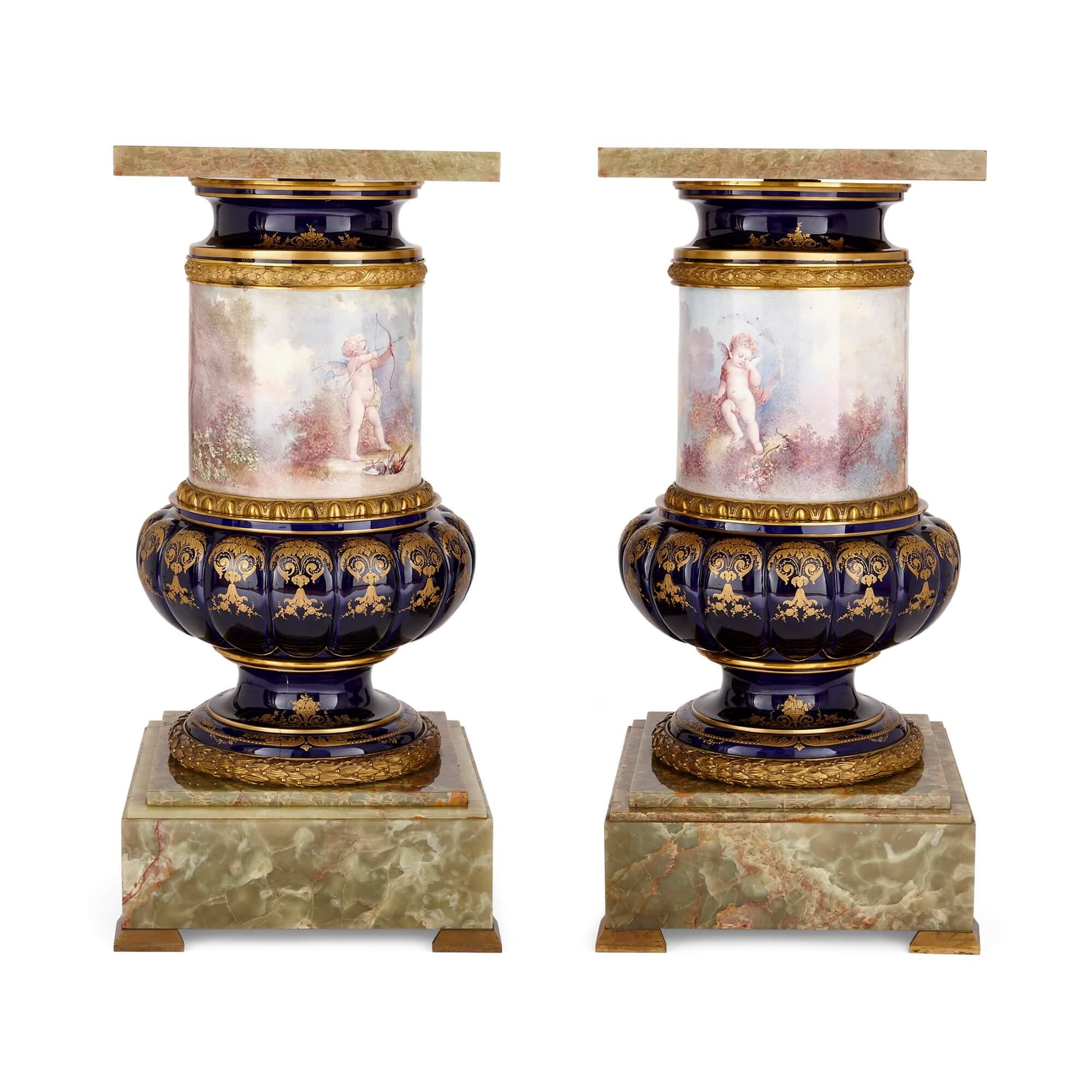 Pair of large Sèvres style pedestals in porcelain, ormolu and green onyx
French, late 19th century
Height 87cm, width 40cm, depth 40cm

These beautiful wares are a pair of large, antique, Sèvres-style pedestals in porcelain, ormolu, and framed