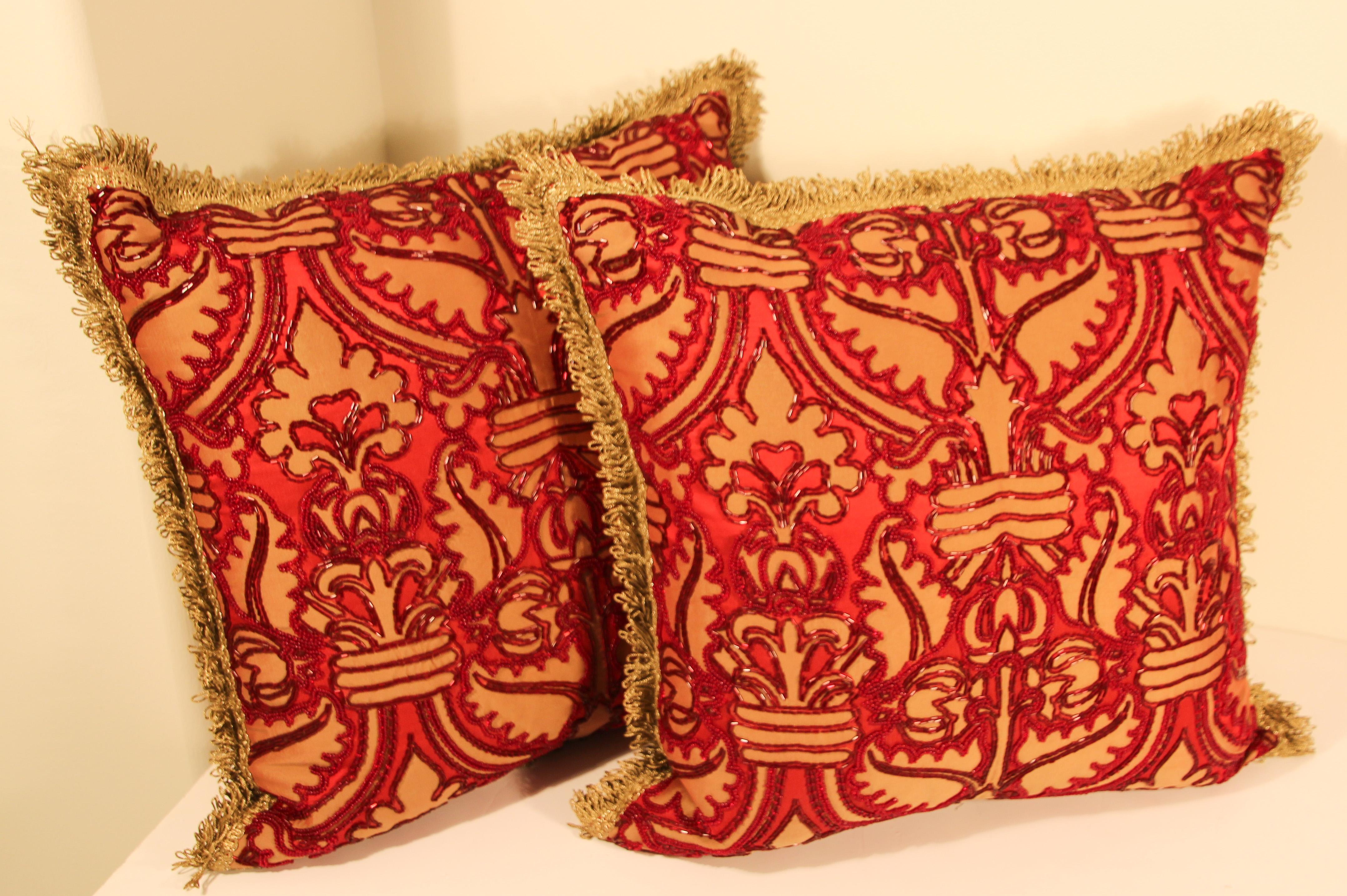 Pair of large handmade silk pillows with metallic threads and embroidered with rich metallic and red beads.
Goose down-and-feather inserts filled and only a pair available, custom made.
Handcrafted by Morison and Company, one of a kind numbered.