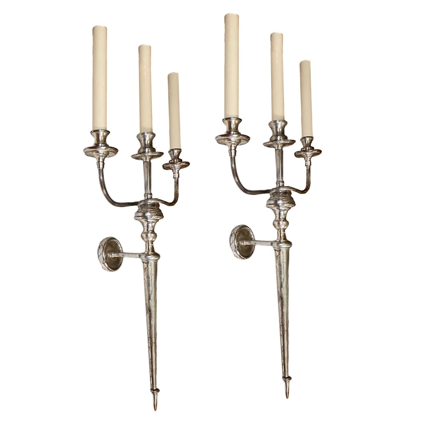 Pair of Italian 1930s silver plated three-arm sconces.
Measurements:
Height 25