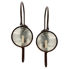 Paire de grandes appliques en fer forgé à une seule lumière