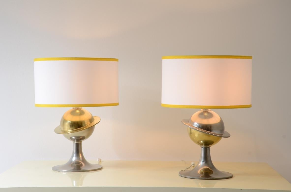
COD-2623
Pair of large Space Age table lamps with two-tone chromed brass base and fabric lampshade.

Italian manufacture,1960s