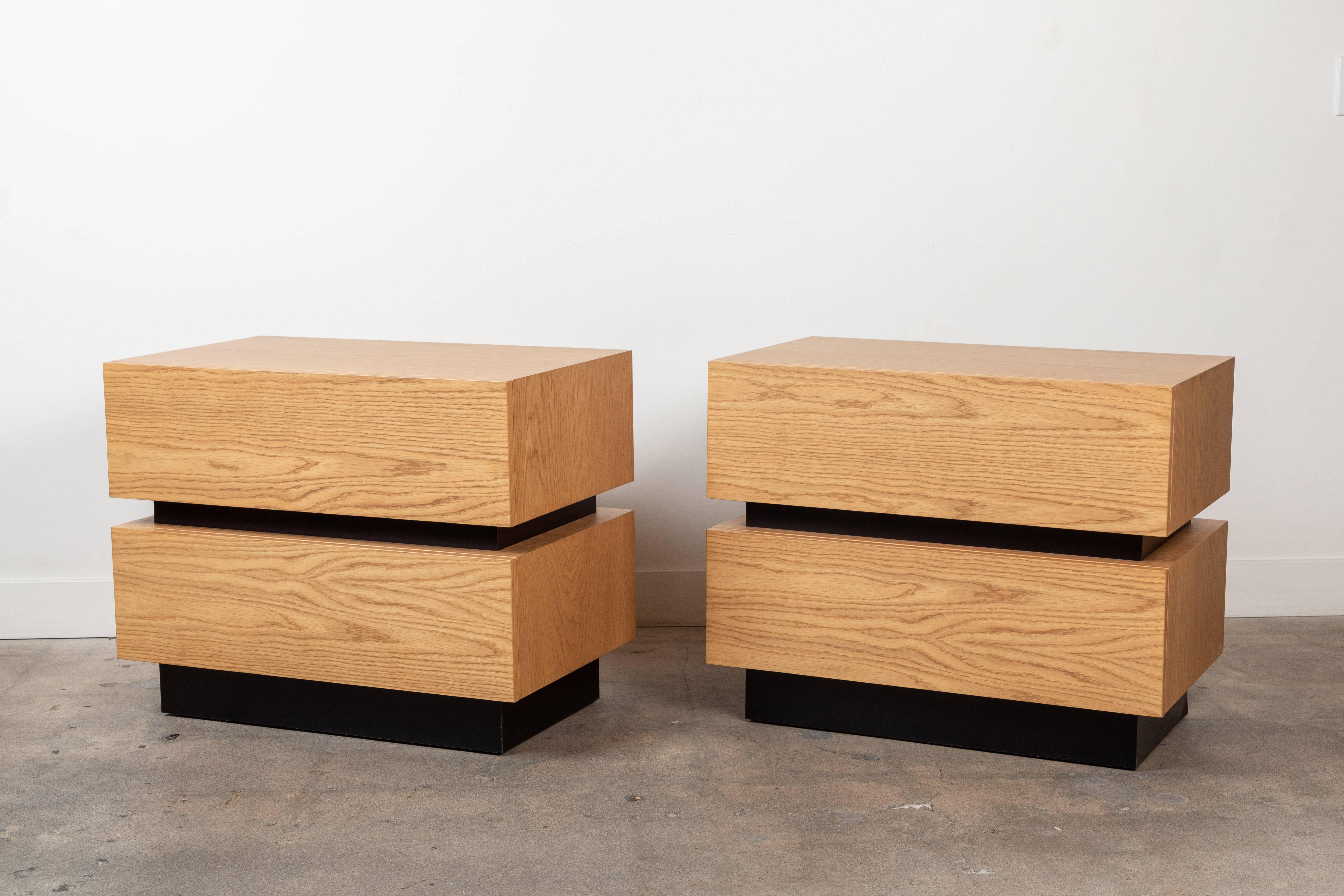 Pair of large stacked box nightstands by Lawson-Fenning in oiled oak with matte black metal inset. 

Available to order in various finishes with a 10-12 week lead time.