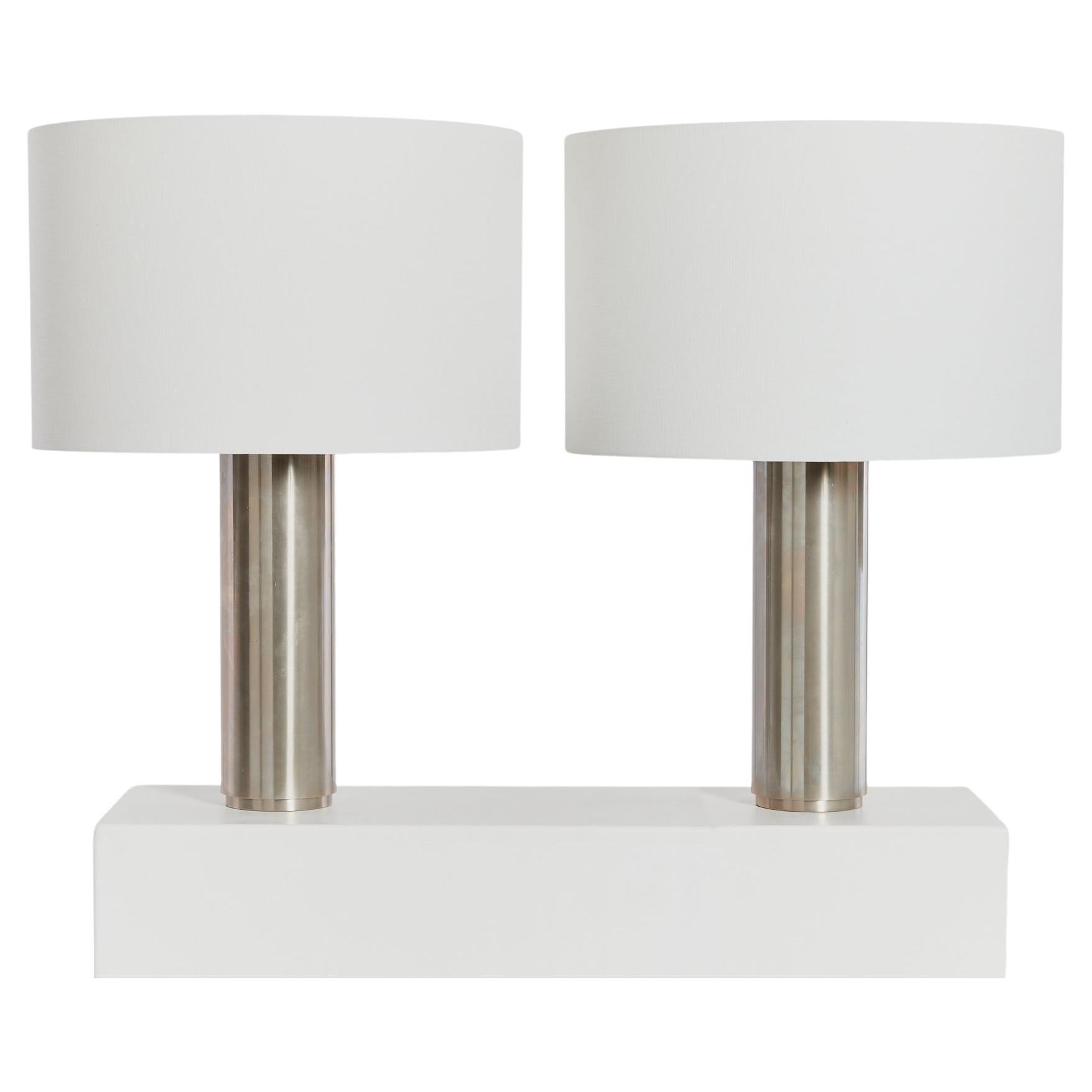 Pair of postmodern large steel cylinder table lamps, with new linen shades
