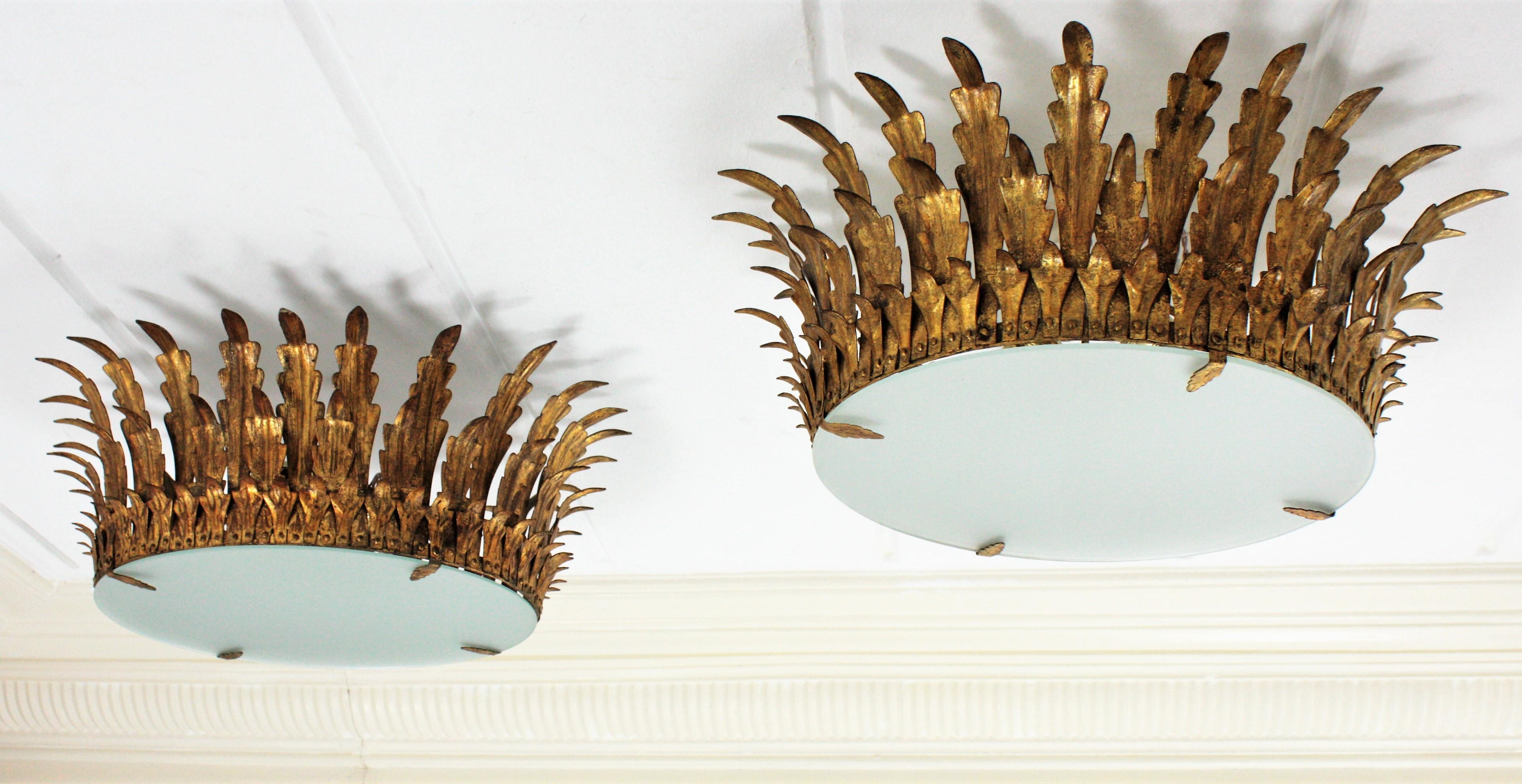 Gold Leaf Pair of Large Sunburst Crown Flush Mount Light Fixtures in Wrought Gilt Iron For Sale