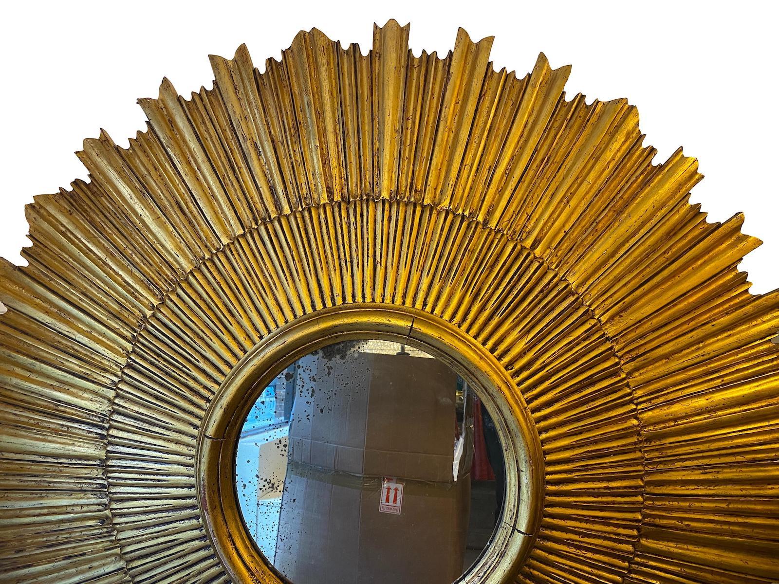 Italian Pair of Large Sunburst Giltwood Mirrors For Sale