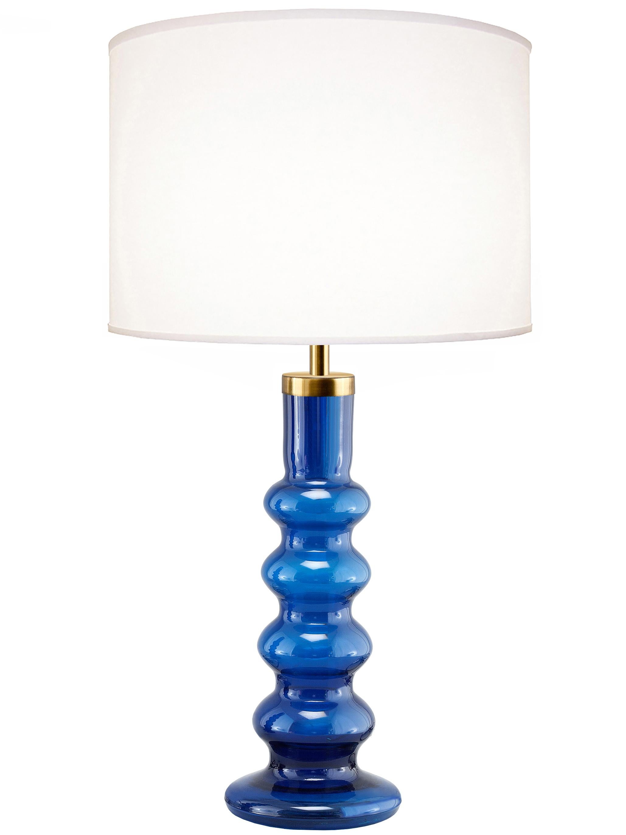 A pair of large blue glass lamps with brass hardware, Swedish, 1960s.