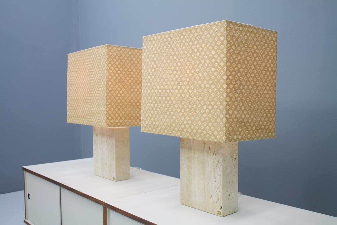 Pair of heavy and large travertine and brass table lamps by Draenert, Germany, 1970s

measurements without the shades in cm: H 72.5 cm, W 25 cm, D 10 cm,

Weight 15.2 Kilo per lamp

Good condition.