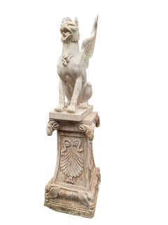 Pair of Large Travertine Marble Griffins on Ram-Head Bases