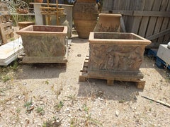 Pair of Large Tuscan Terracotta Planters with Cherub Reliefs