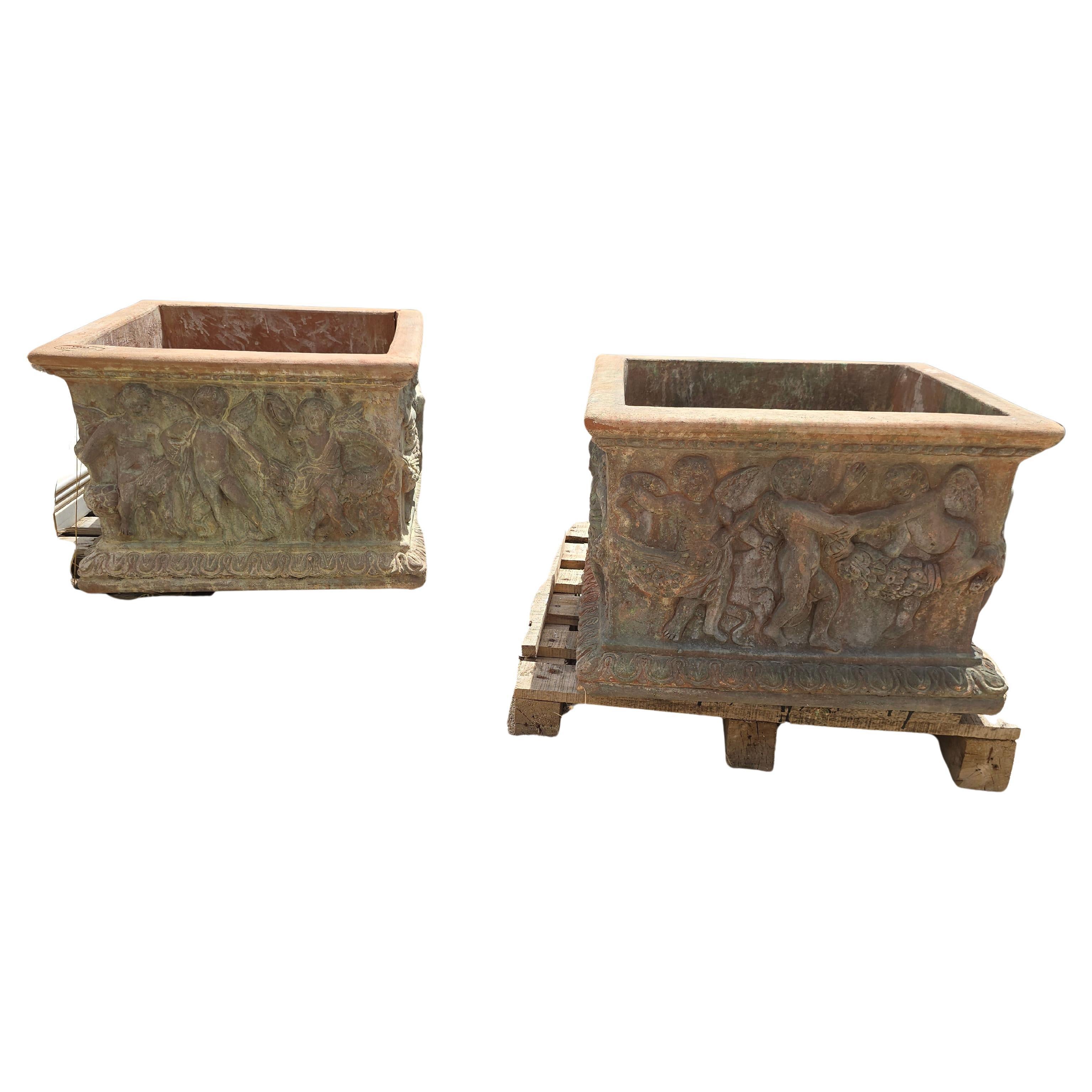 Pair of Large Tuscan Terracotta Planters with Cherub Reliefs For Sale
