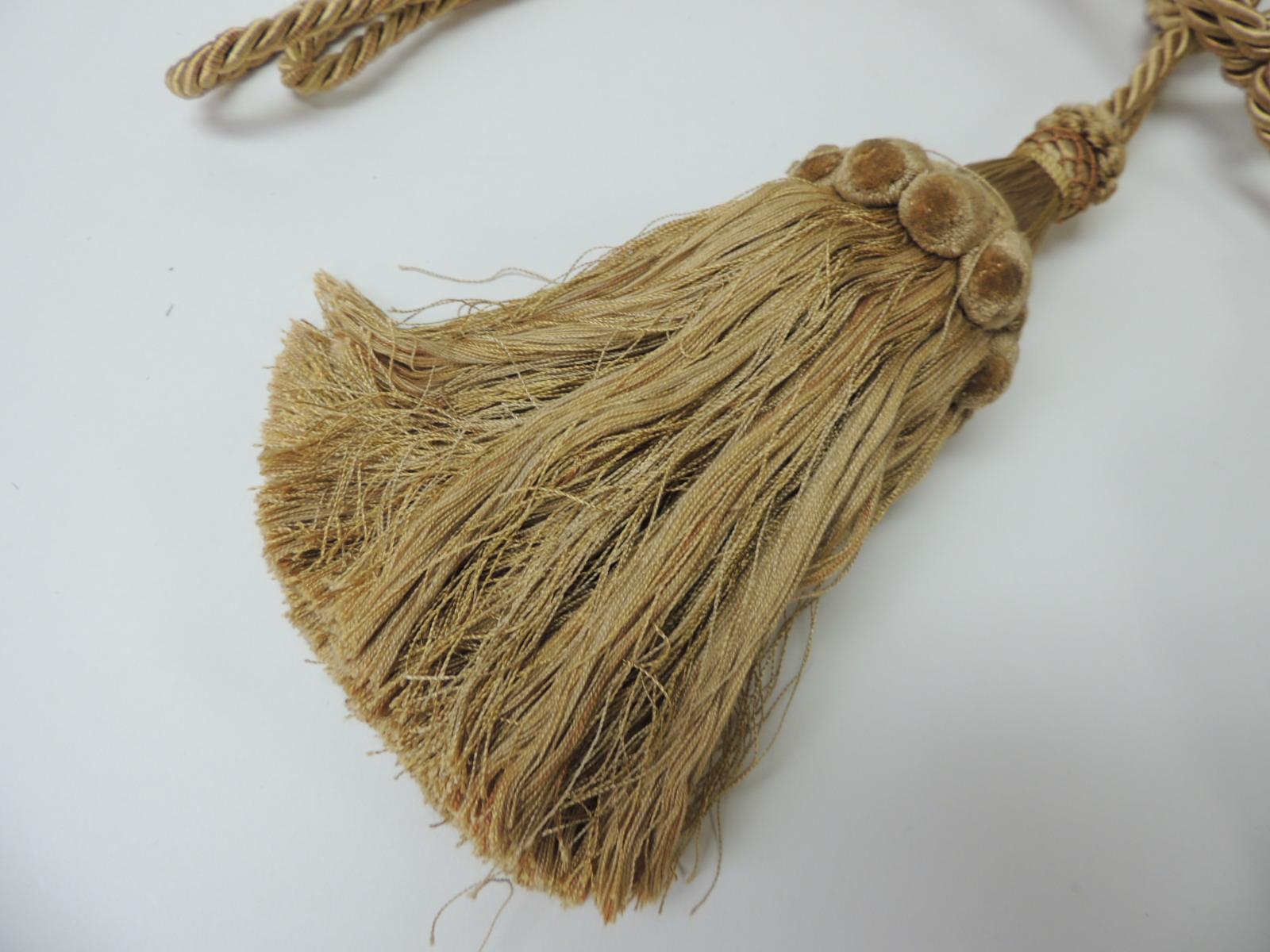 Pair of large twisted silk rope gold tassels.
Size: 28