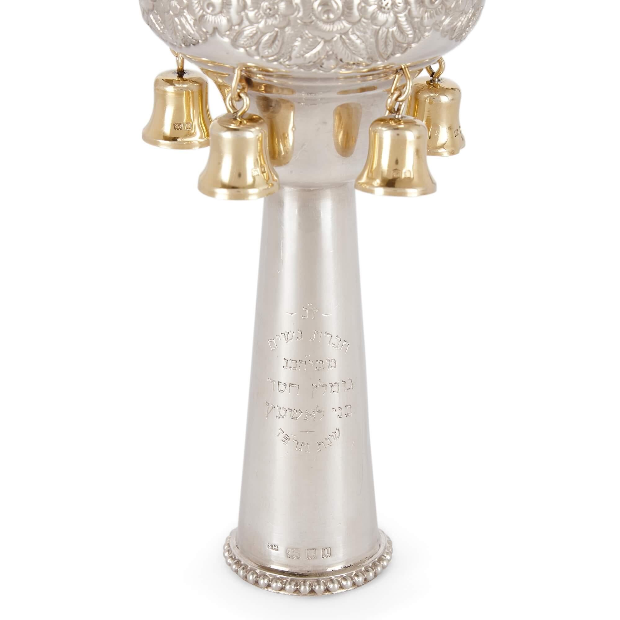 Pair of large, very fine English silver gilt Torah finials or Rimonim
London, 1926
Height 40cm, diameter 9cm

Wrought from silver and embellished with touches of silver gilt, these fine items of antique Judaica are a pair of Rimonim, Torah