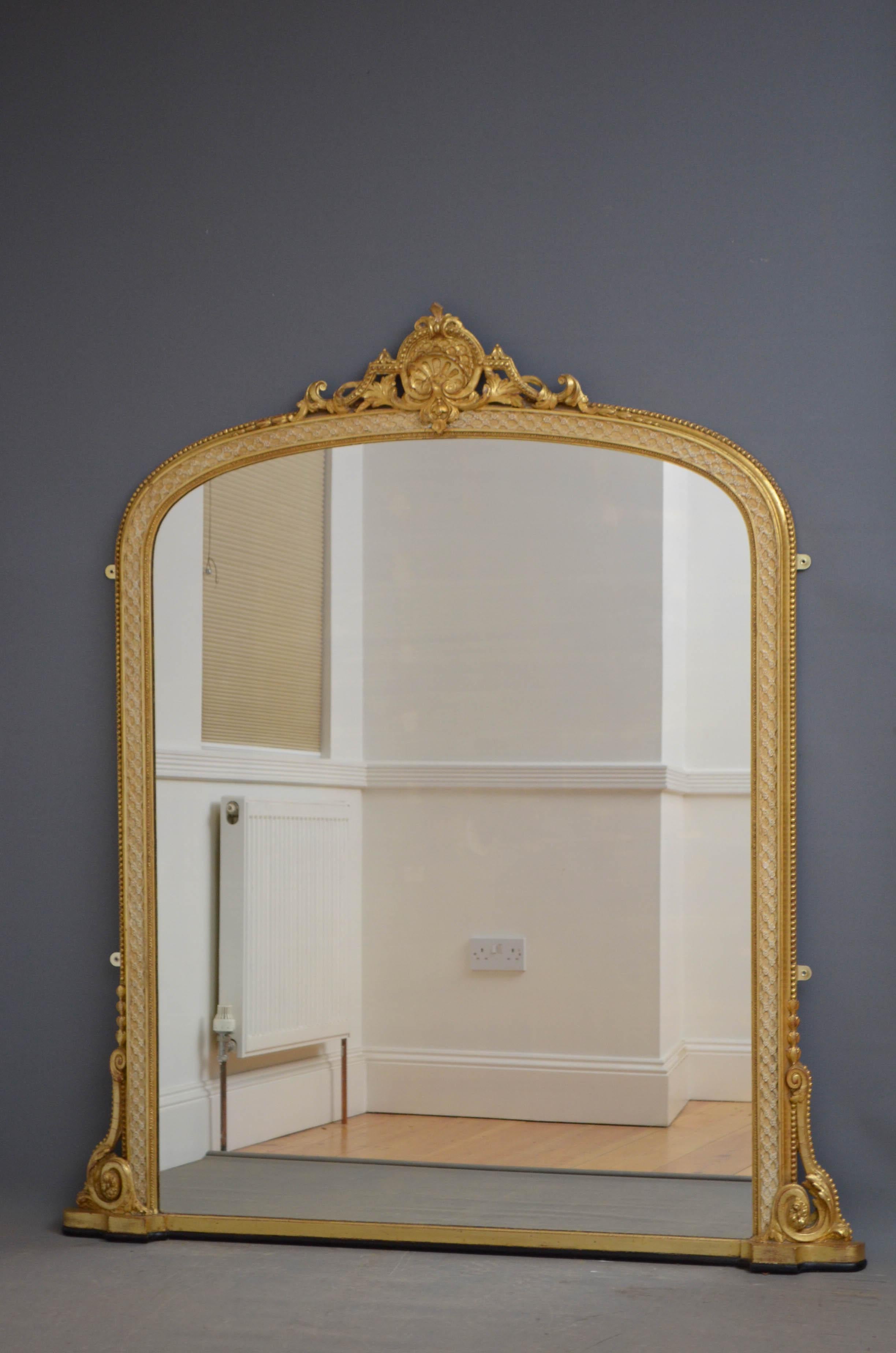 K0469, a rare pair of Victorian giltwood wall mirrors, each having arched glass, one being original with some imperfections, other a replacement in carved frame with side scrolls and centre crest to the top (possibly a later addition). Each mirror