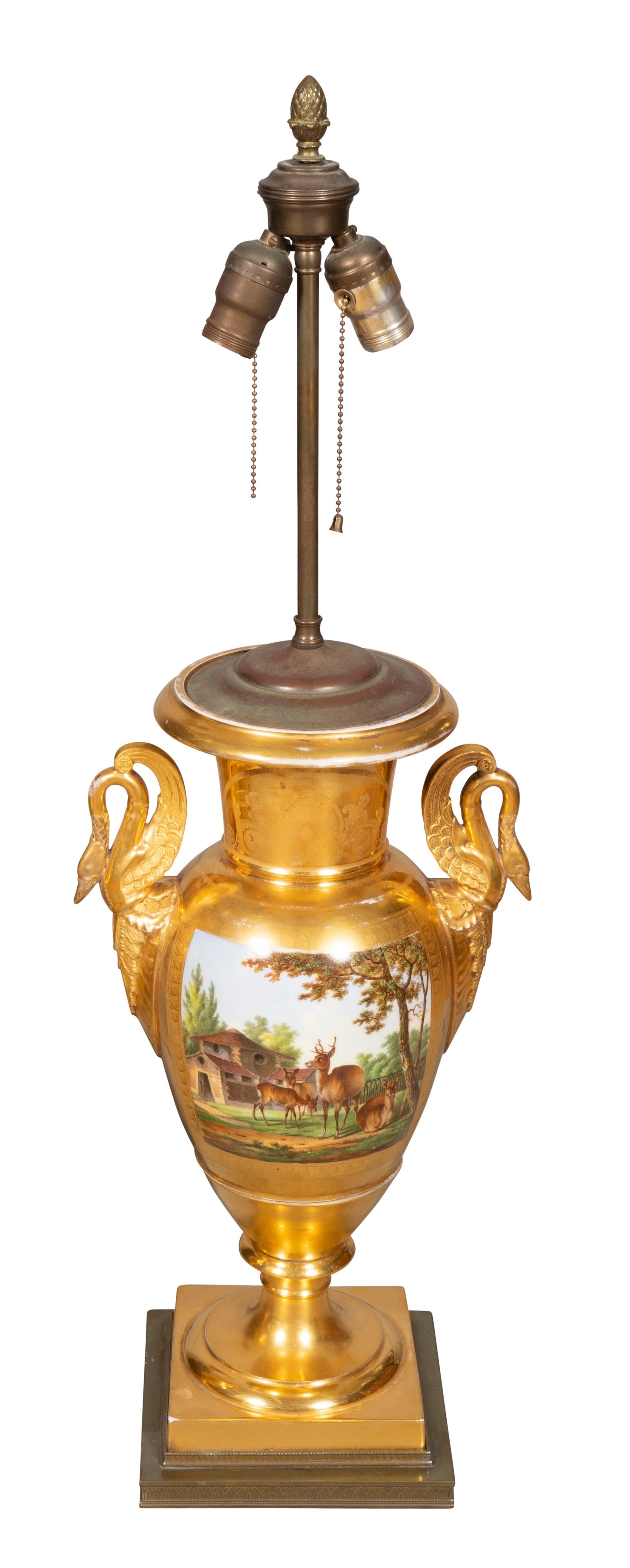 Old vieux Paris porcelain from the Napoleonic period decorated with farm animals and barn. With swan handles. Beautifully painted and fire gilded. Now mounted as lamps.