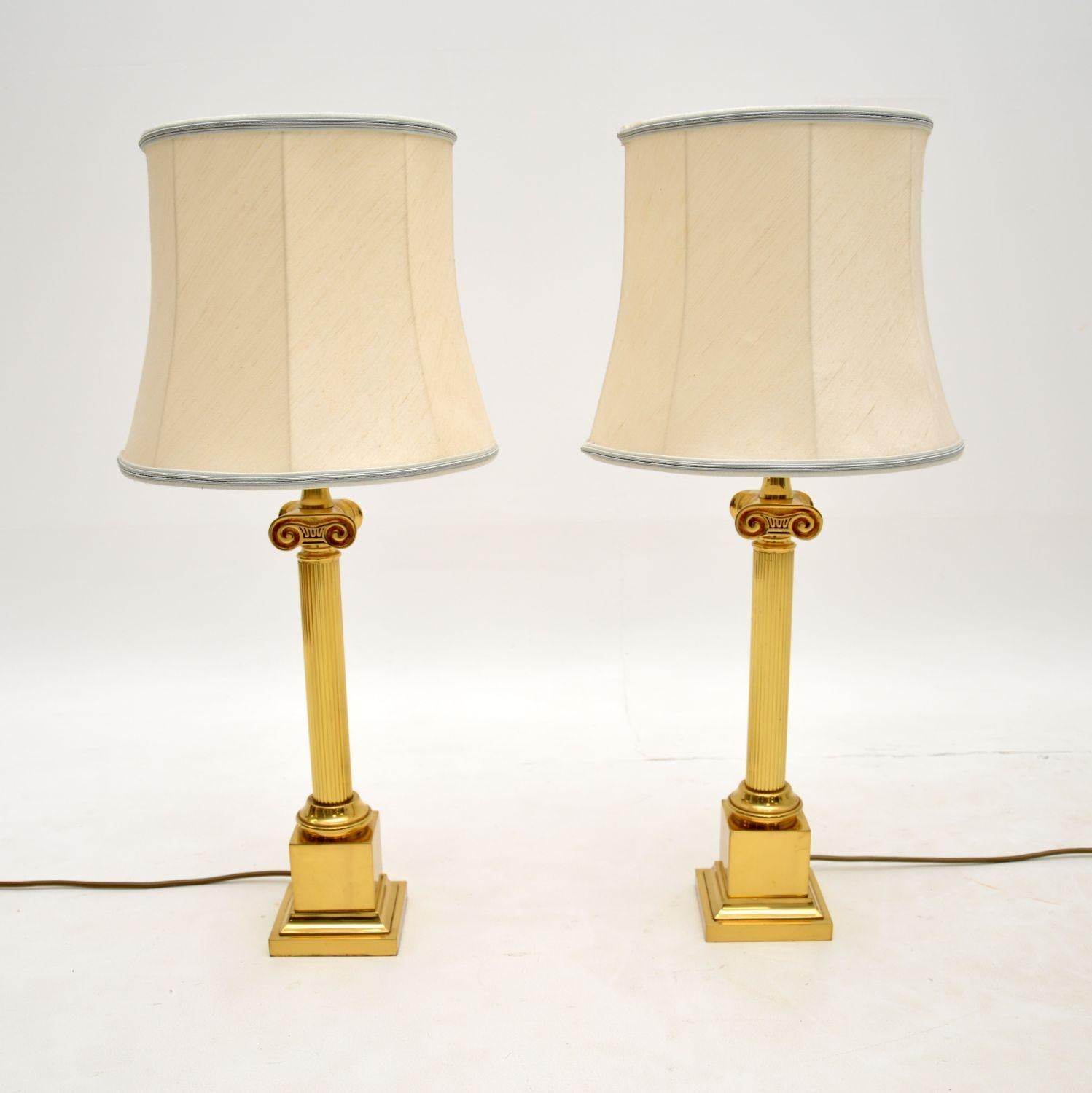 A stylish and impressive pair of vintage table lamps in the antique neoclassical style. These were made in England, they date from the 1960-70’s.

They are of superb quality and are very large for table lamps. They are designed as Corinthian