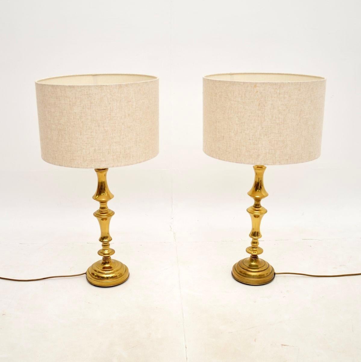 A superb pair of large vintage brass table lamps. They were made in England, and they date from the 1970’s.

The quality is outstanding, the solid brass frames are very large, impressive and well made.

The condition is excellent, with only some
