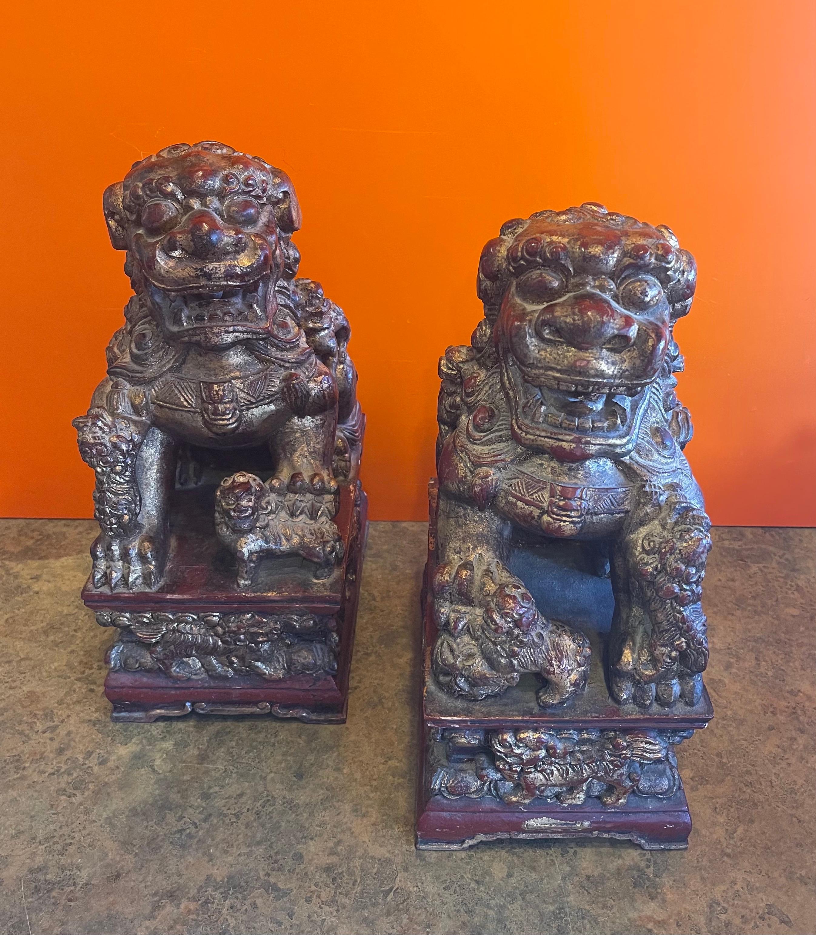 20th Century Pair of Large Vintage Chinese Hand Carved Gold Giltwood Foo Dogs For Sale